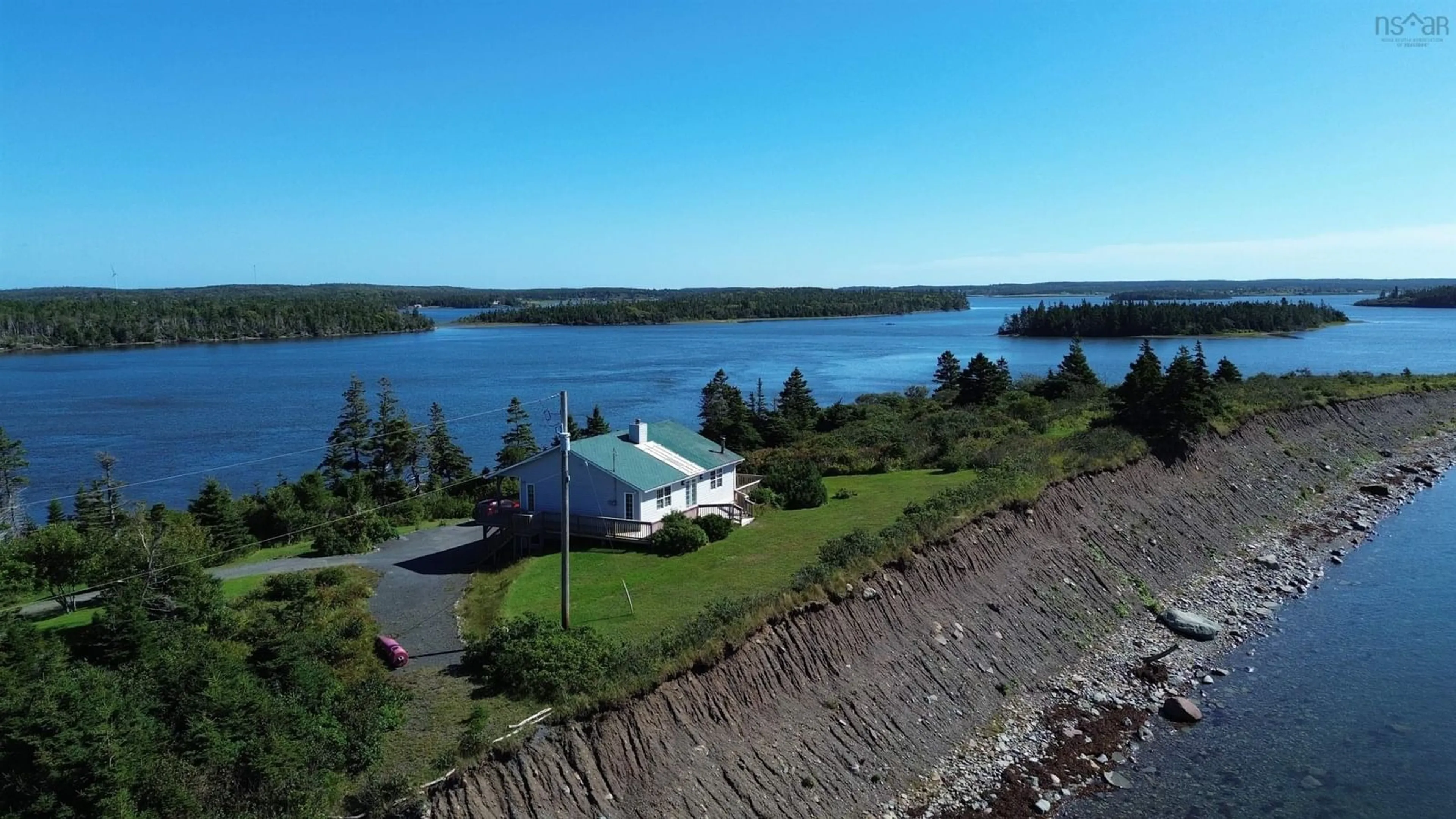 A pic from outside/outdoor area/front of a property/back of a property/a pic from drone, water/lake/river/ocean view for 755 Janvrin Harbour Road, Janvrin Harbour Nova Scotia B0E 3J0