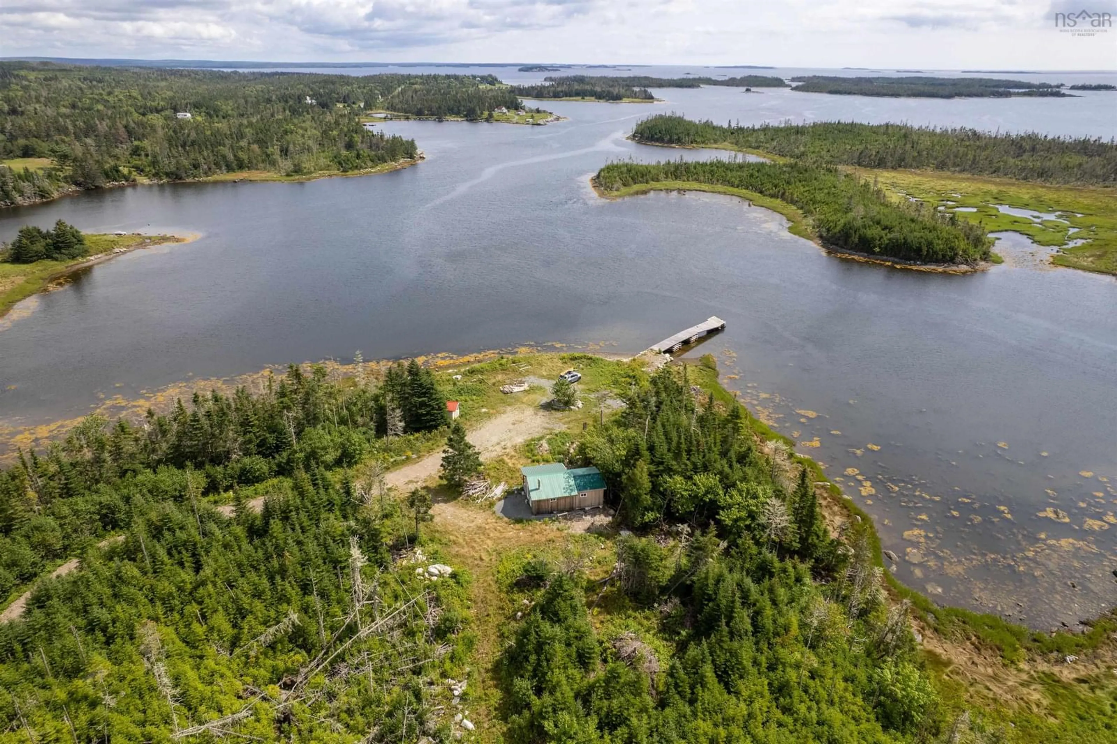A pic from outside/outdoor area/front of a property/back of a property/a pic from drone, water/lake/river/ocean view for 27376 Highway 7, Harrigan Cove Nova Scotia B0J 2K0