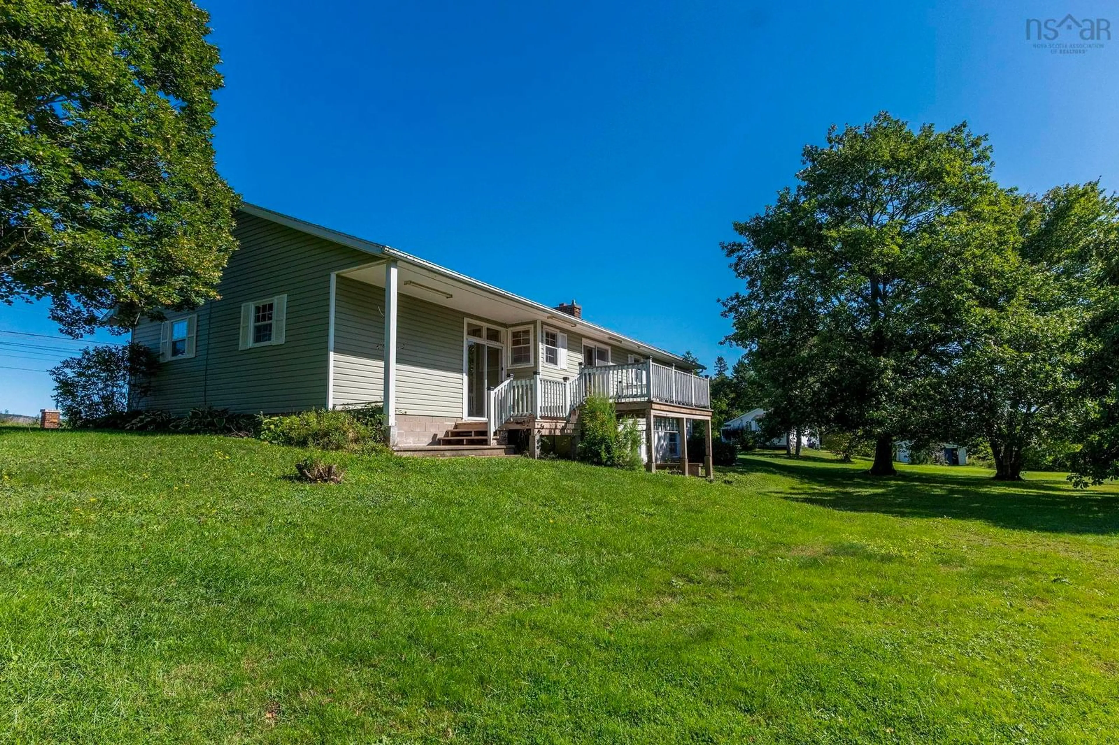 A pic from outside/outdoor area/front of a property/back of a property/a pic from drone, unknown for 9520 Highway 1, Bridgetown East Nova Scotia B0S 1C0