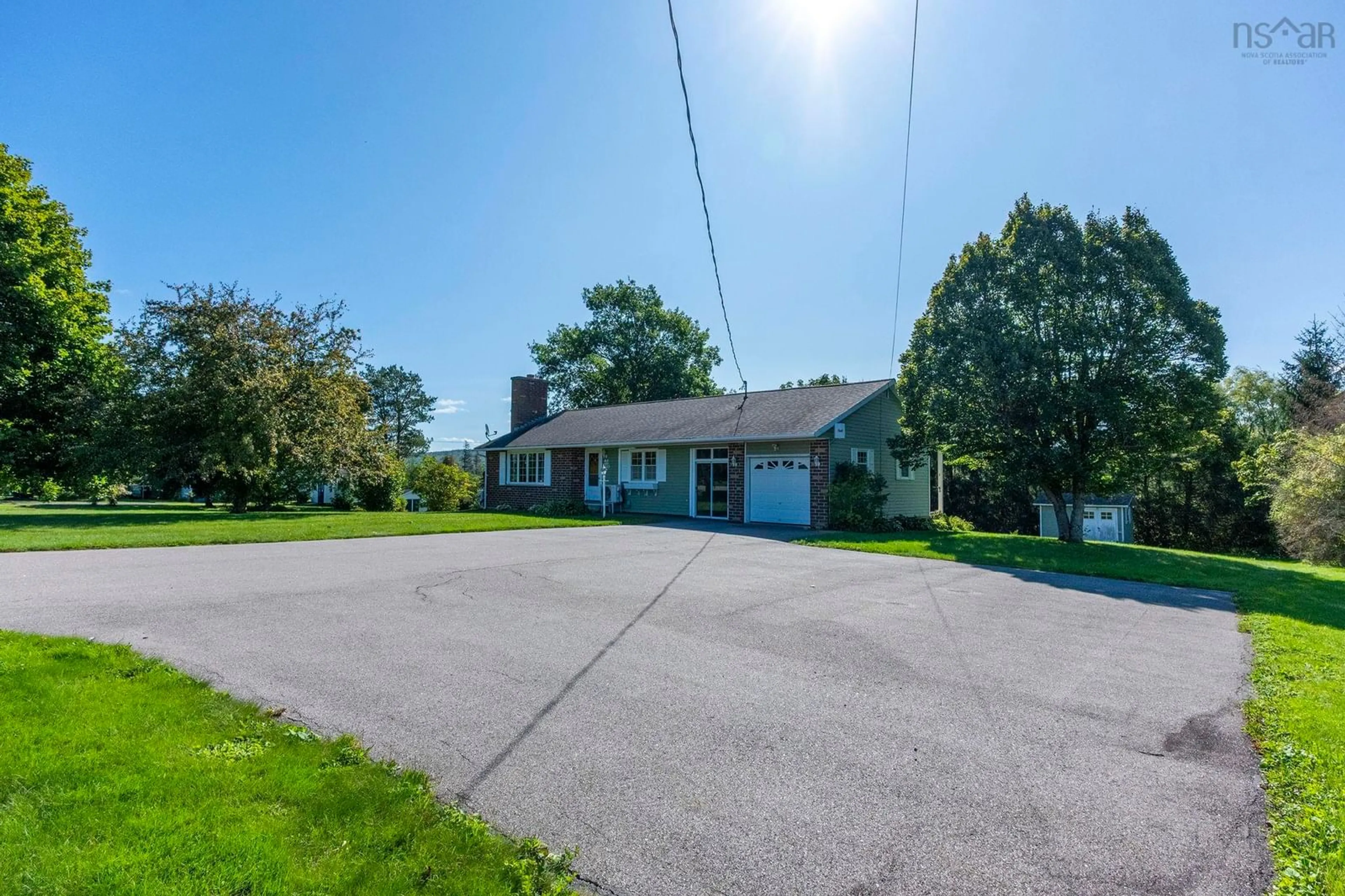 A pic from outside/outdoor area/front of a property/back of a property/a pic from drone, street for 9520 Highway 1, Bridgetown East Nova Scotia B0S 1C0