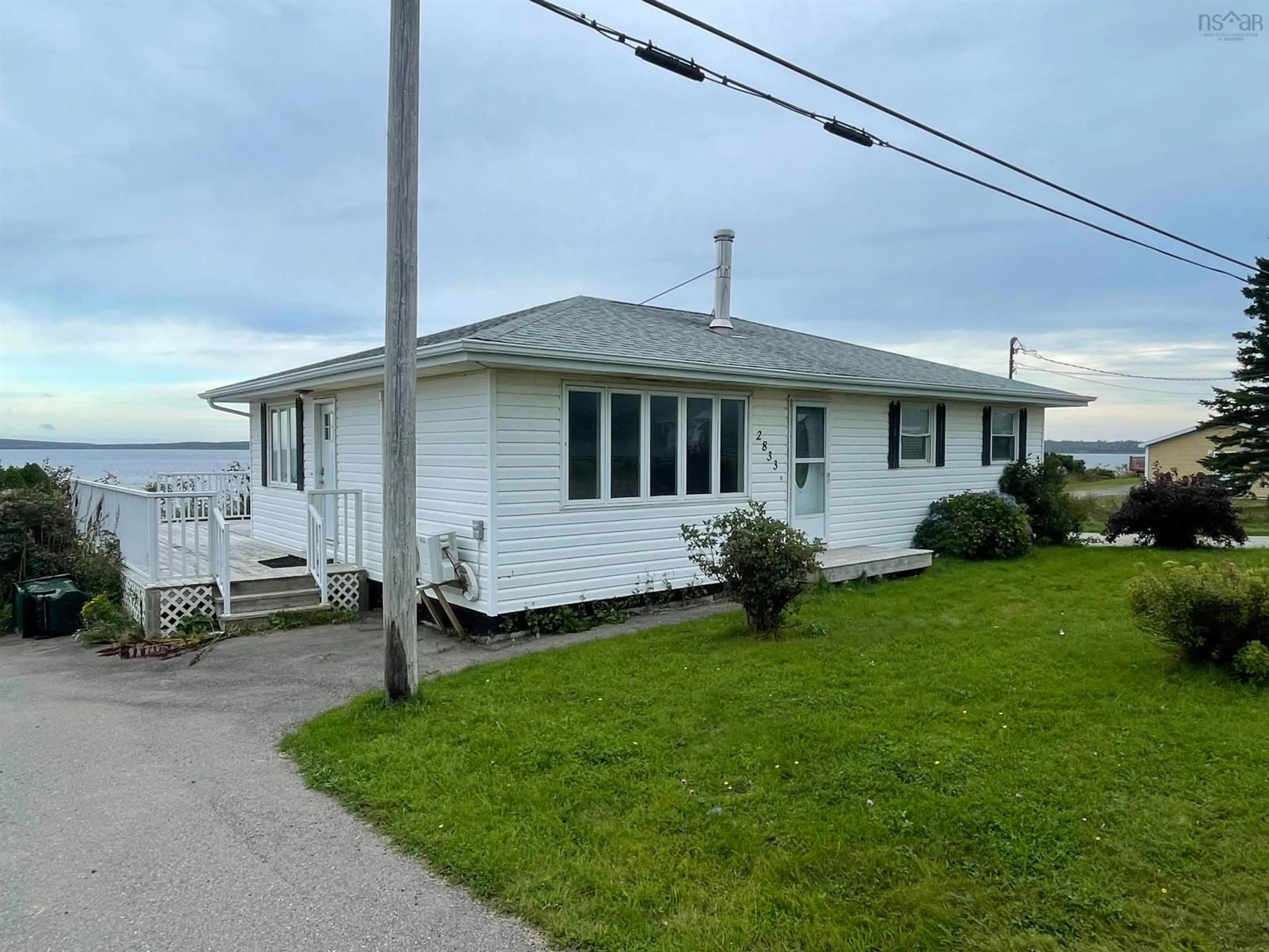 A pic from outside/outdoor area/front of a property/back of a property/a pic from drone, water/lake/river/ocean view for 2833 Highway 255, Port Morien Nova Scotia B1B 1V9