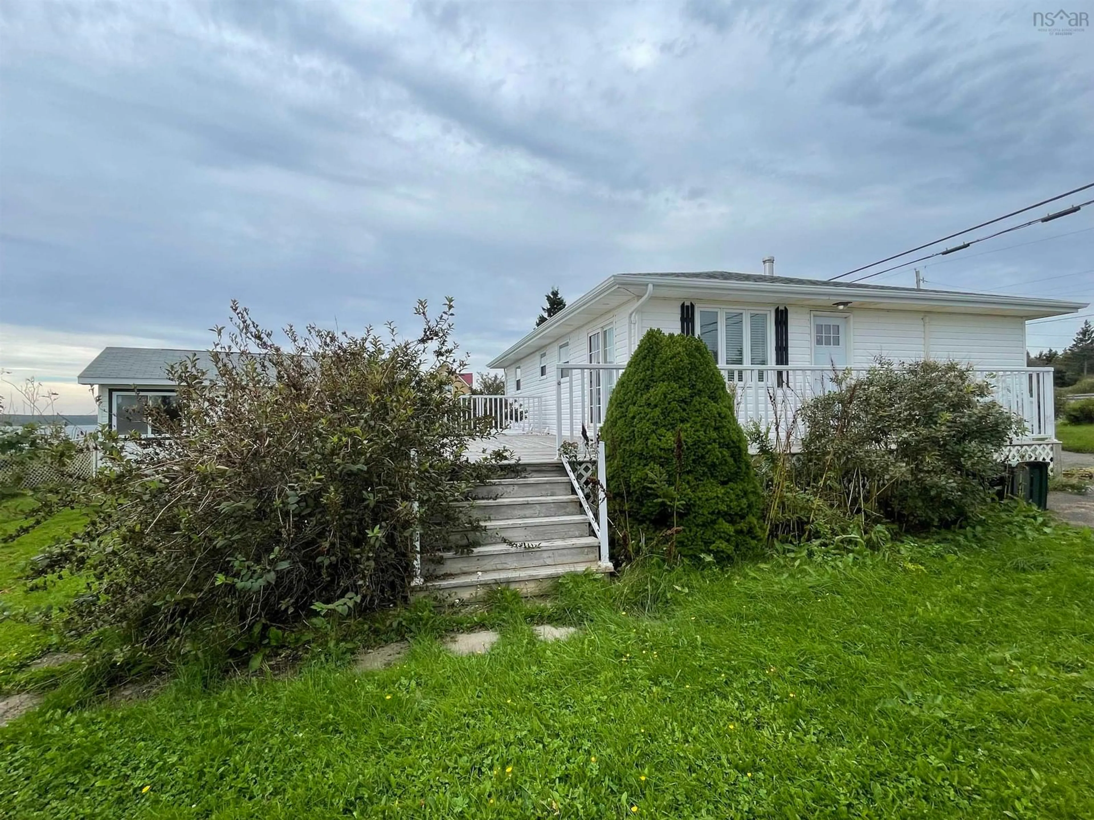 A pic from outside/outdoor area/front of a property/back of a property/a pic from drone, unknown for 2833 Highway 255, Port Morien Nova Scotia B1B 1V9