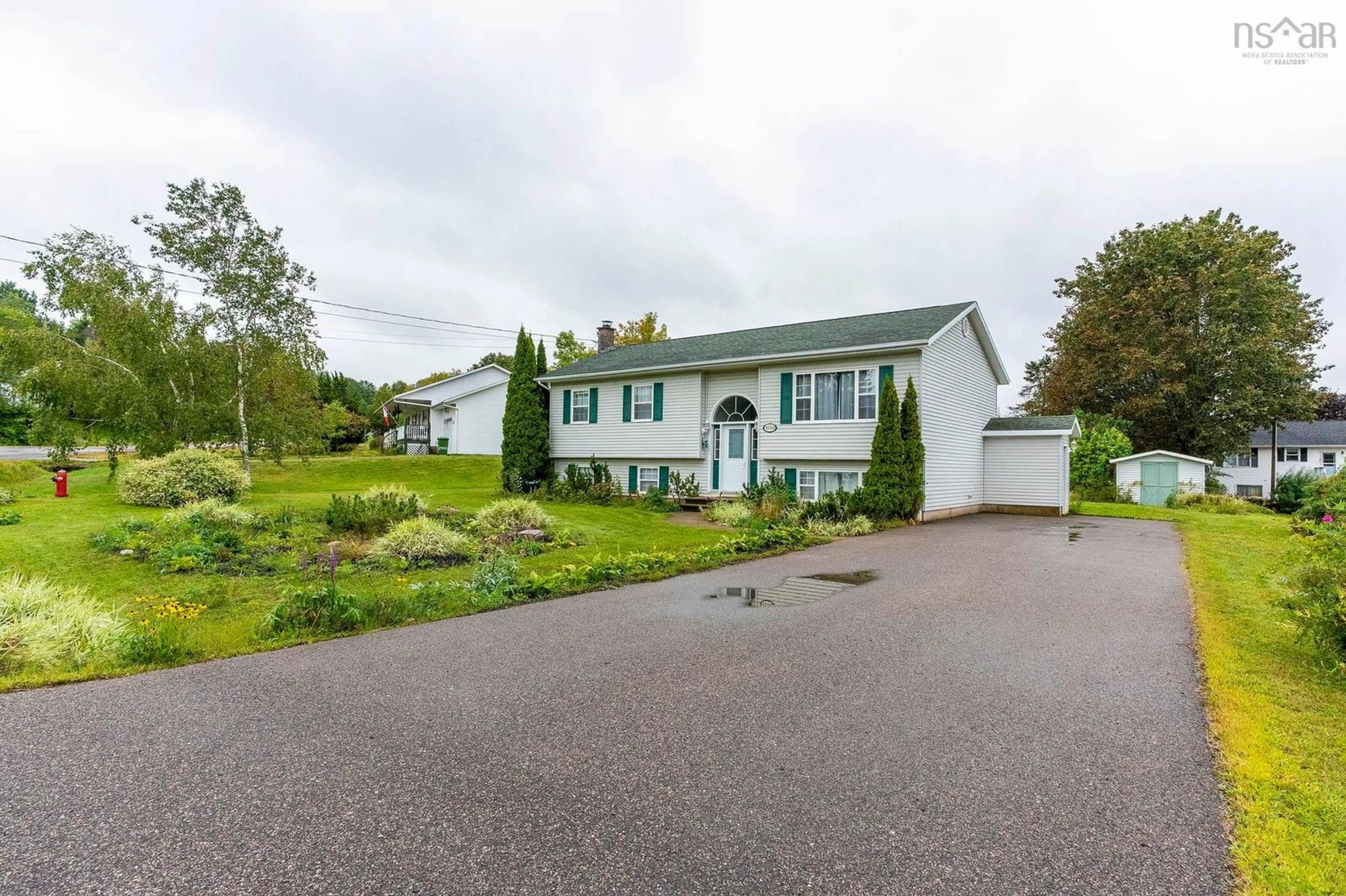 A pic from outside/outdoor area/front of a property/back of a property/a pic from drone, street for 1030 Club Cres, New Minas Nova Scotia B4N 4Z5