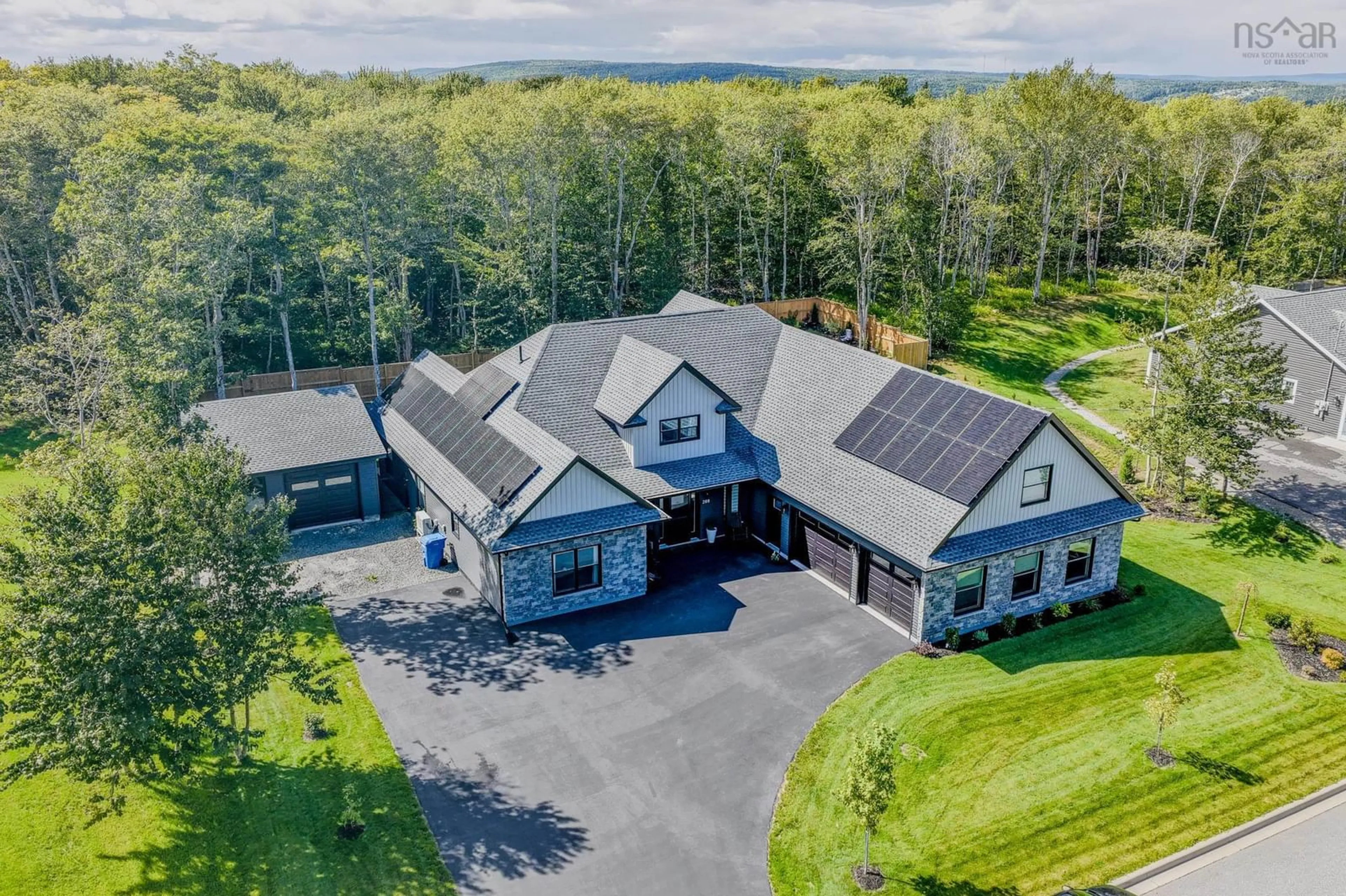 A pic from outside/outdoor area/front of a property/back of a property/a pic from drone, unknown for 288 Fatima Dr, Sydney River Nova Scotia B1S 0M2