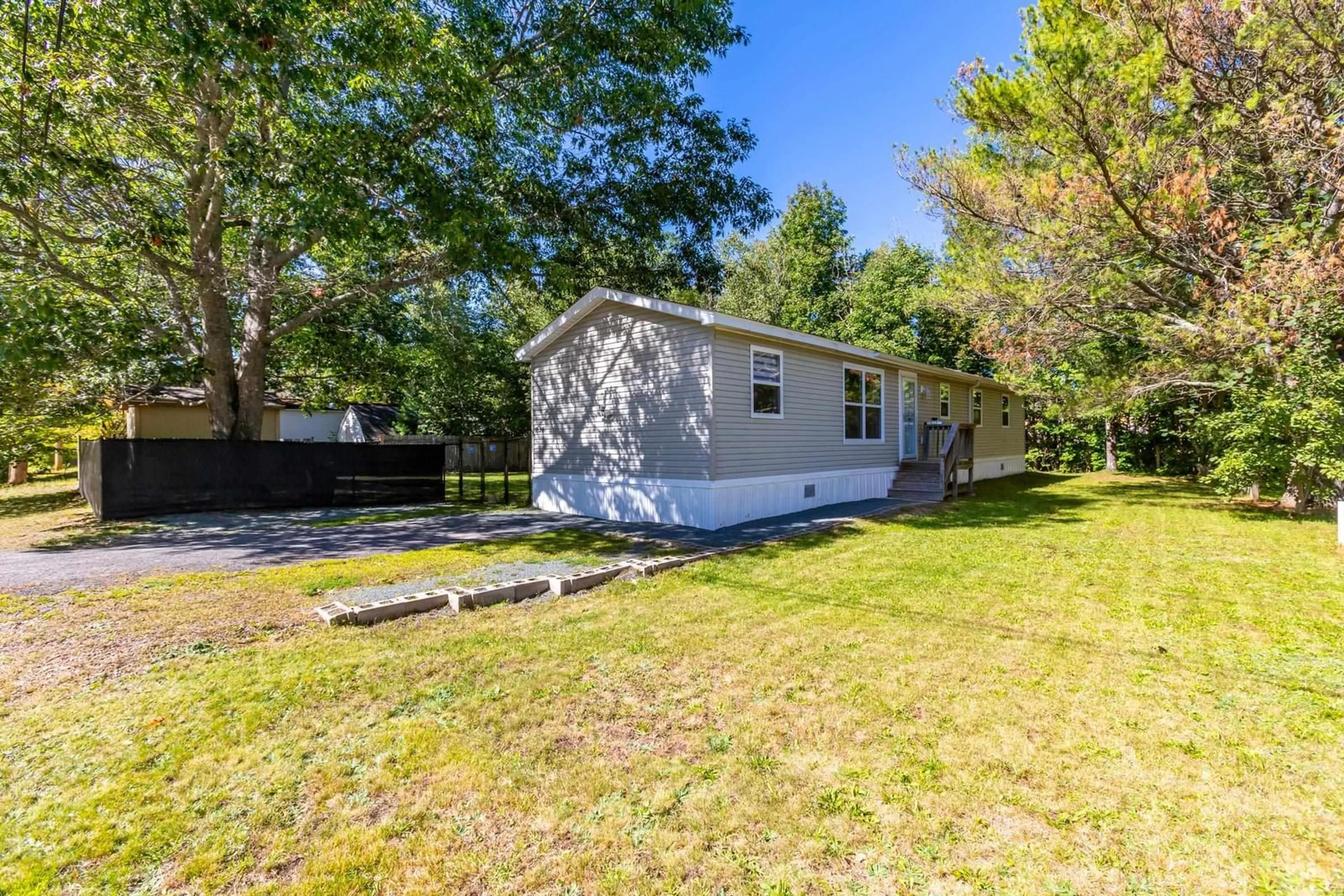 A pic from outside/outdoor area/front of a property/back of a property/a pic from drone, water/lake/river/ocean view for 1020 Dakota Lane, Greenwood Nova Scotia B0P 1N0