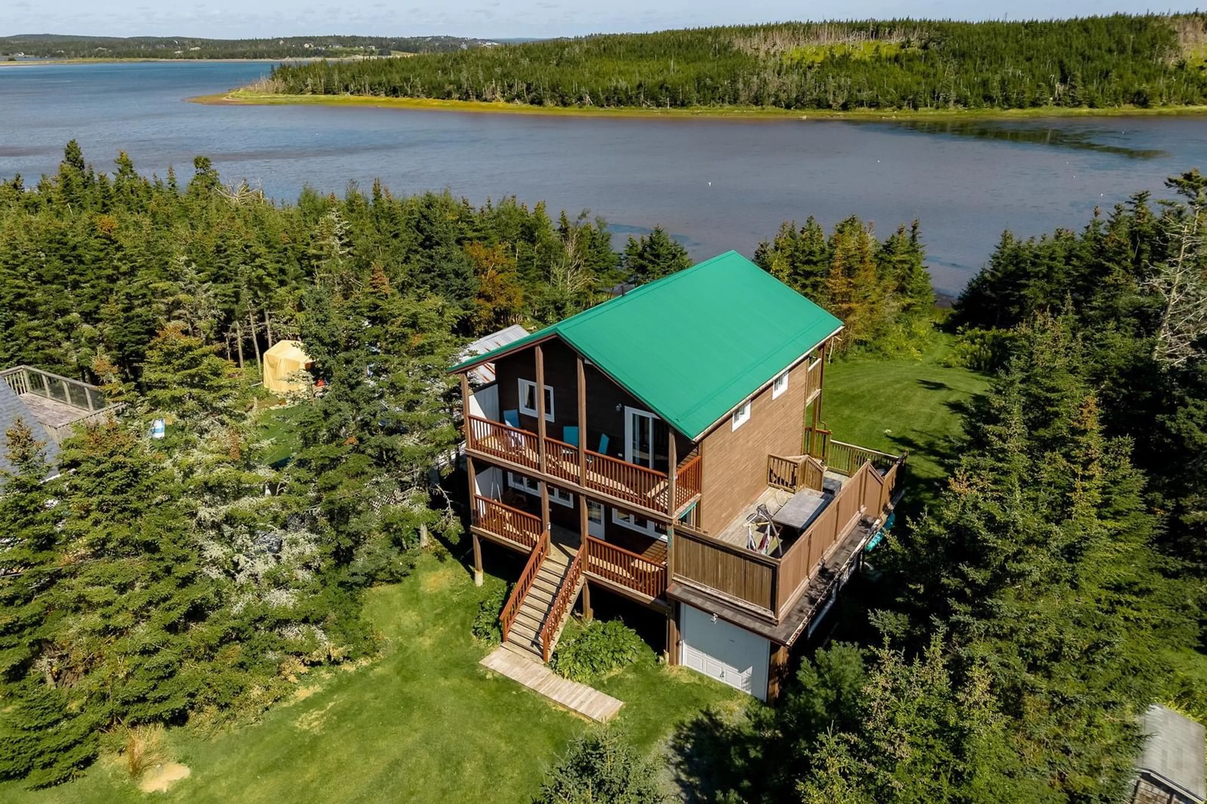 A pic from outside/outdoor area/front of a property/back of a property/a pic from drone, water/lake/river/ocean view for 449 Causeway Rd, Seaforth Nova Scotia B0J 2L0
