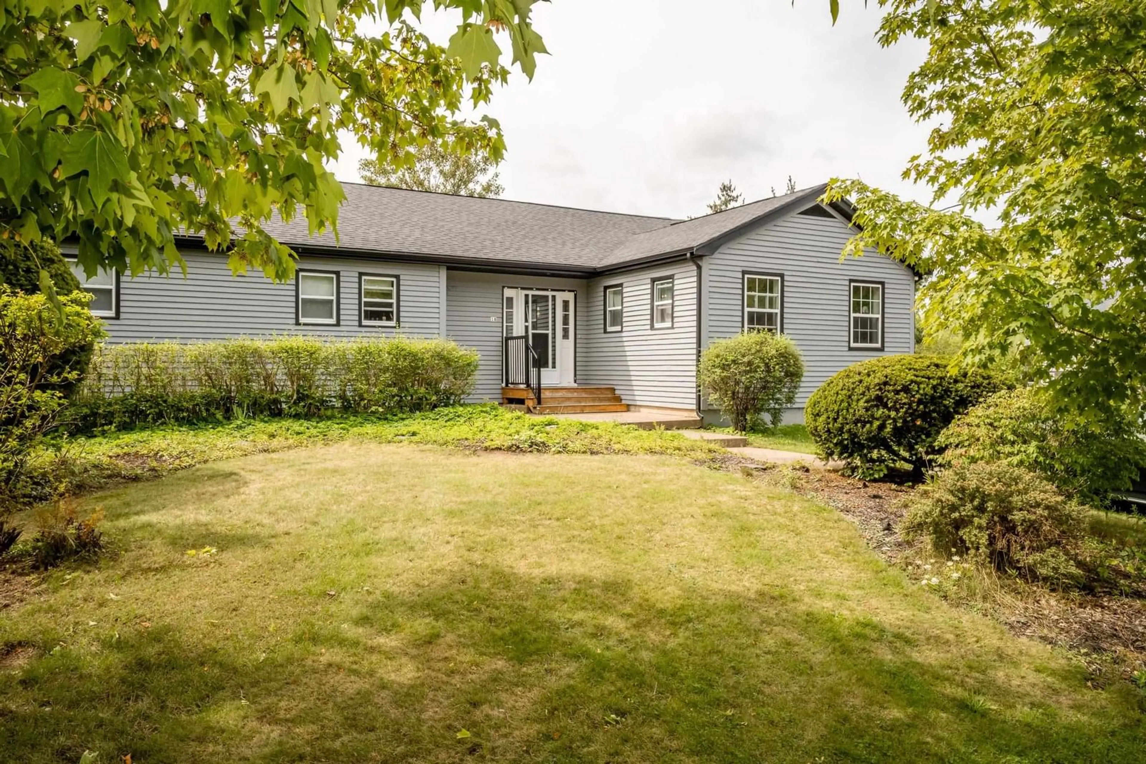 A pic from outside/outdoor area/front of a property/back of a property/a pic from drone, street for 18 Woodman Rd, Wolfville Nova Scotia B4P 2M5