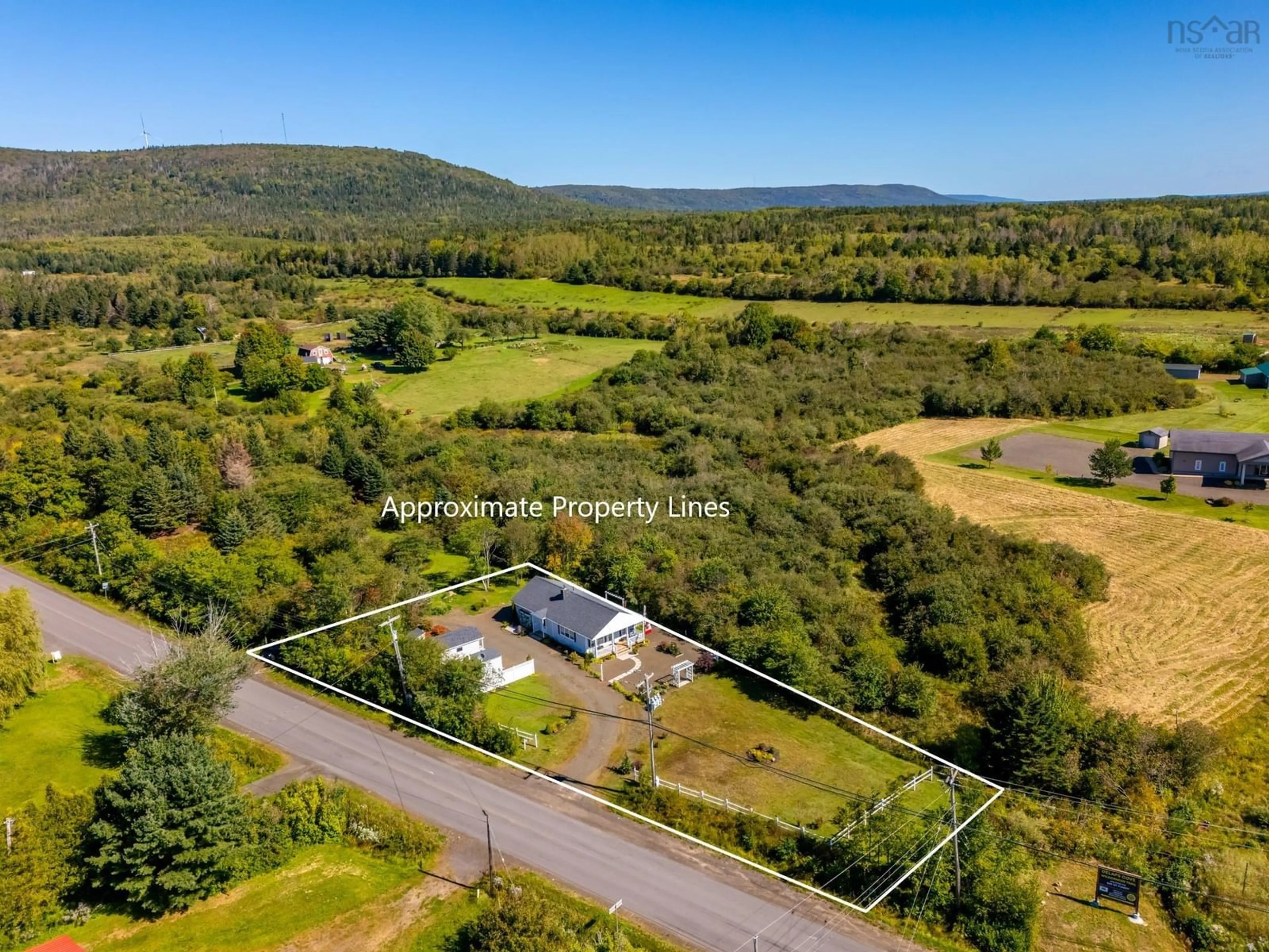 A pic from outside/outdoor area/front of a property/back of a property/a pic from drone, unknown for 18 Parker Mountain Rd, Granville Ferry Nova Scotia B0S 1A0