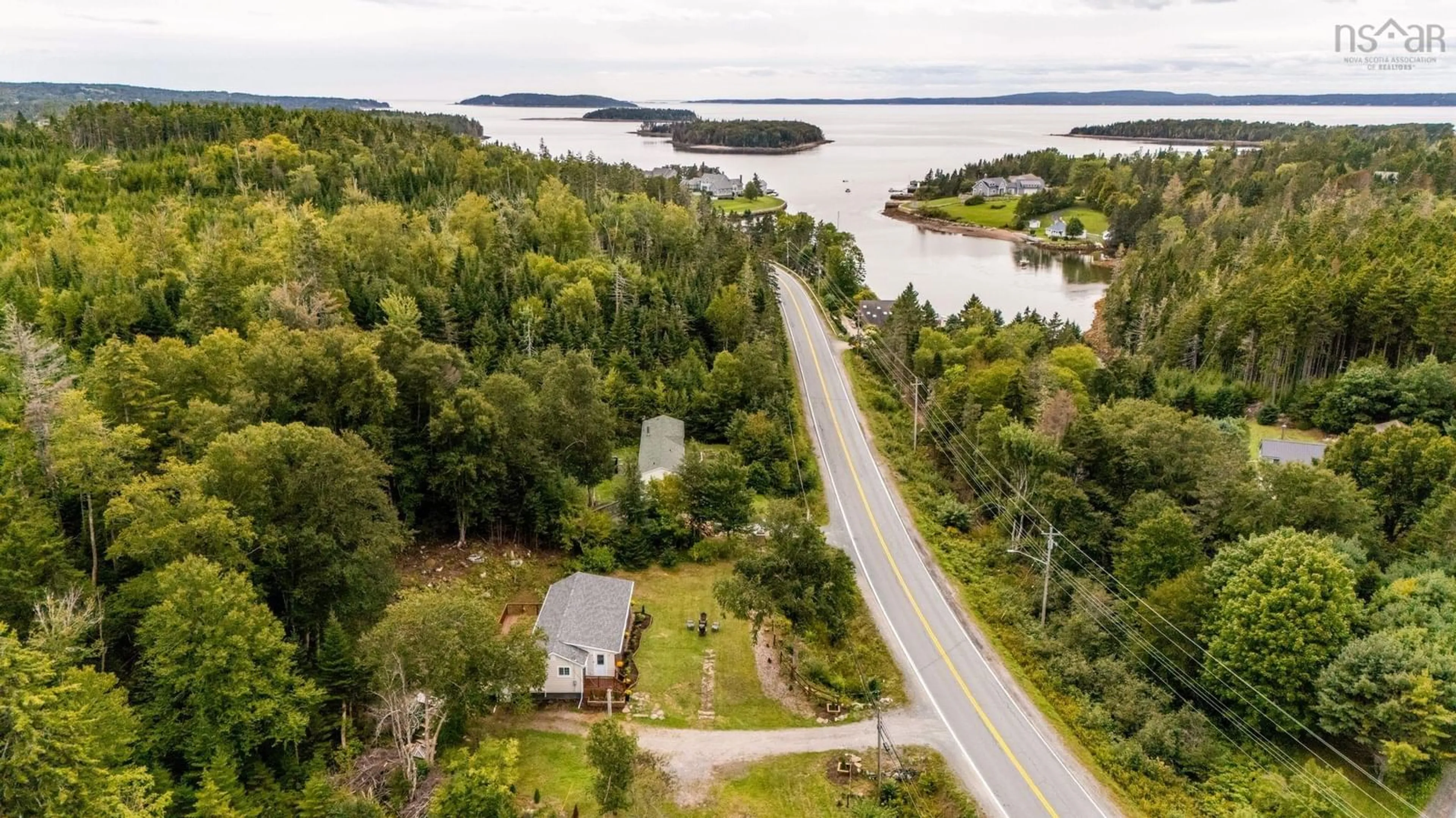 A pic from outside/outdoor area/front of a property/back of a property/a pic from drone, water/lake/river/ocean view for 10951 Peggy's Cove Rd, Seabright Nova Scotia B3Z 3C7