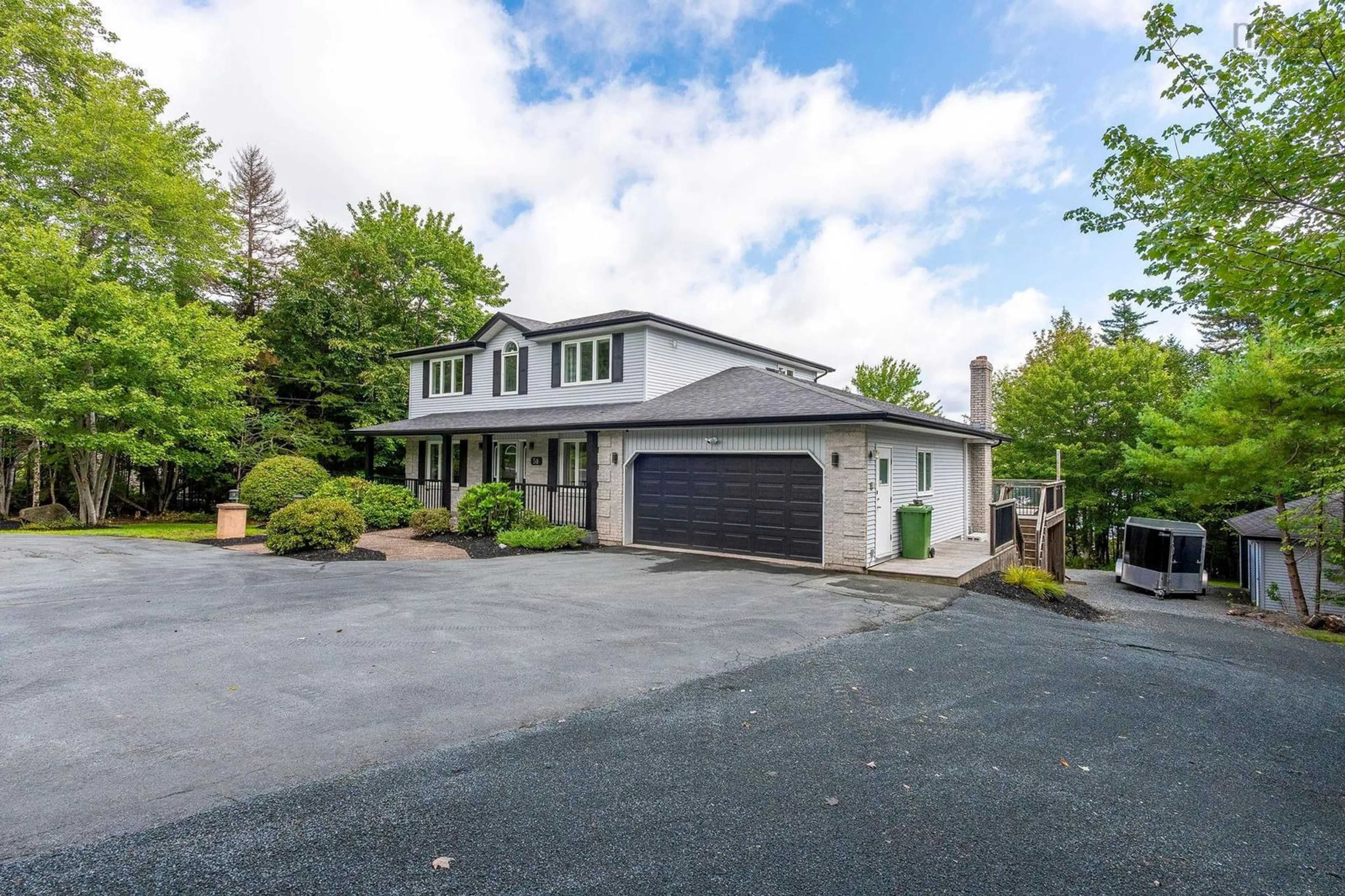 A pic from outside/outdoor area/front of a property/back of a property/a pic from drone, street for 58 Lakefront Dr, Hammonds Plains Nova Scotia B4B 1L4