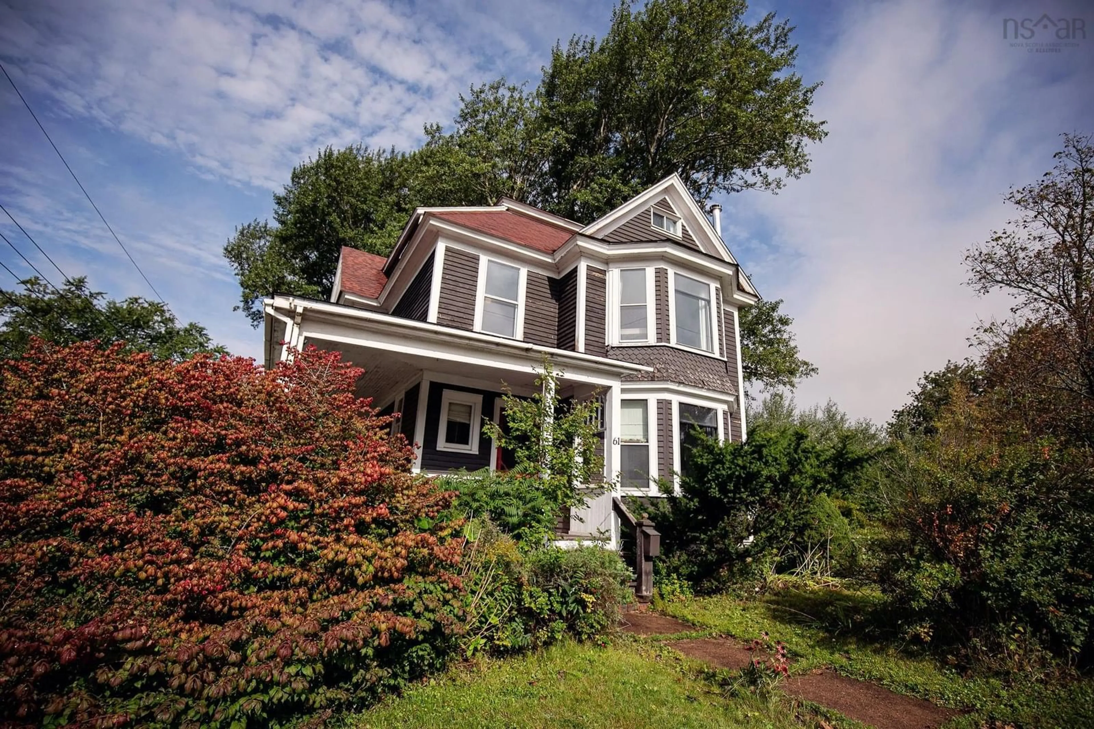 Home with vinyl exterior material, street for 61 Victoria St, Amherst Nova Scotia B4H 1C3
