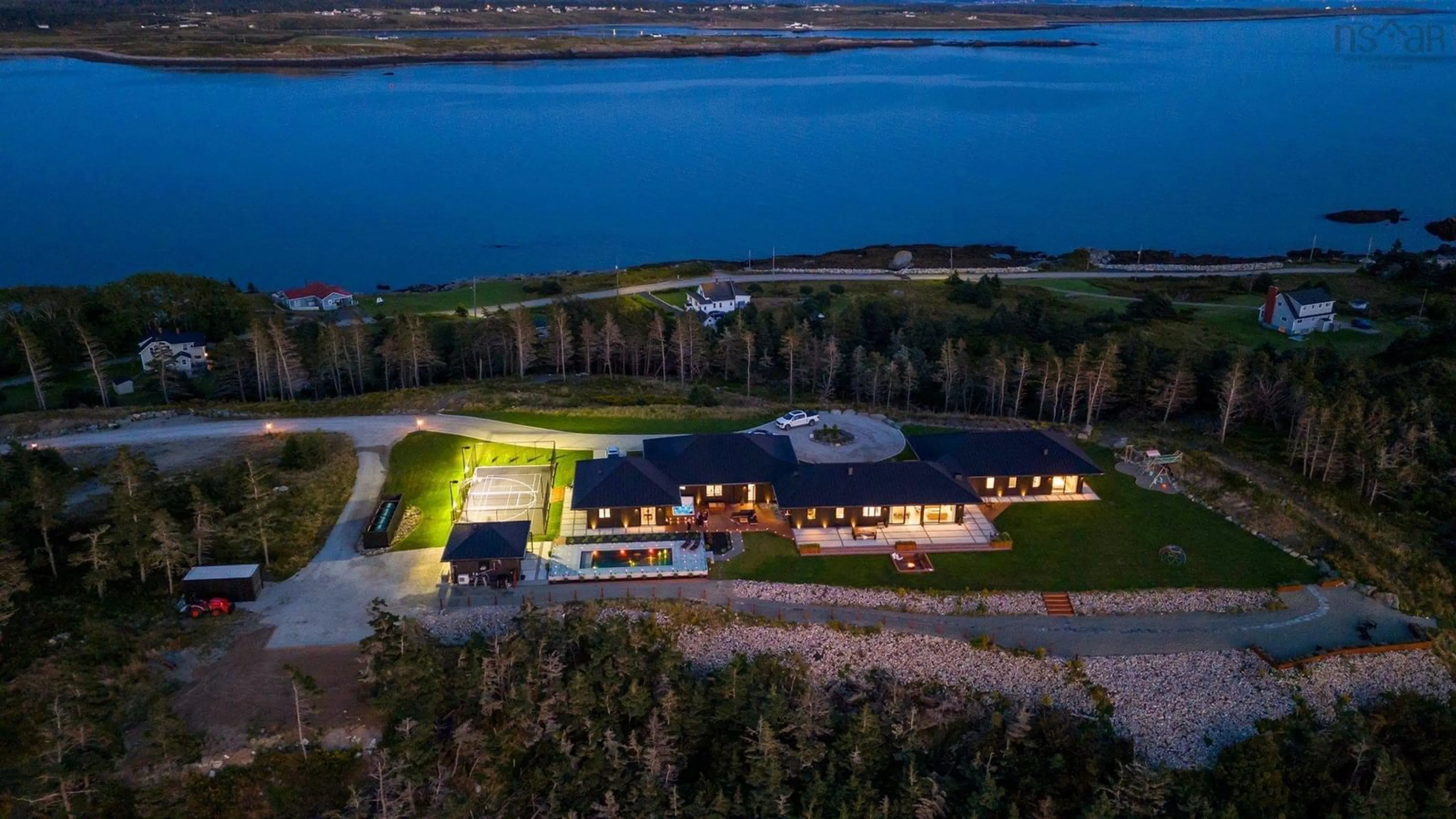 A pic from outside/outdoor area/front of a property/back of a property/a pic from drone, water/lake/river/ocean view for 1766 Highway 304, Cape Forchu Nova Scotia B5A 5G7