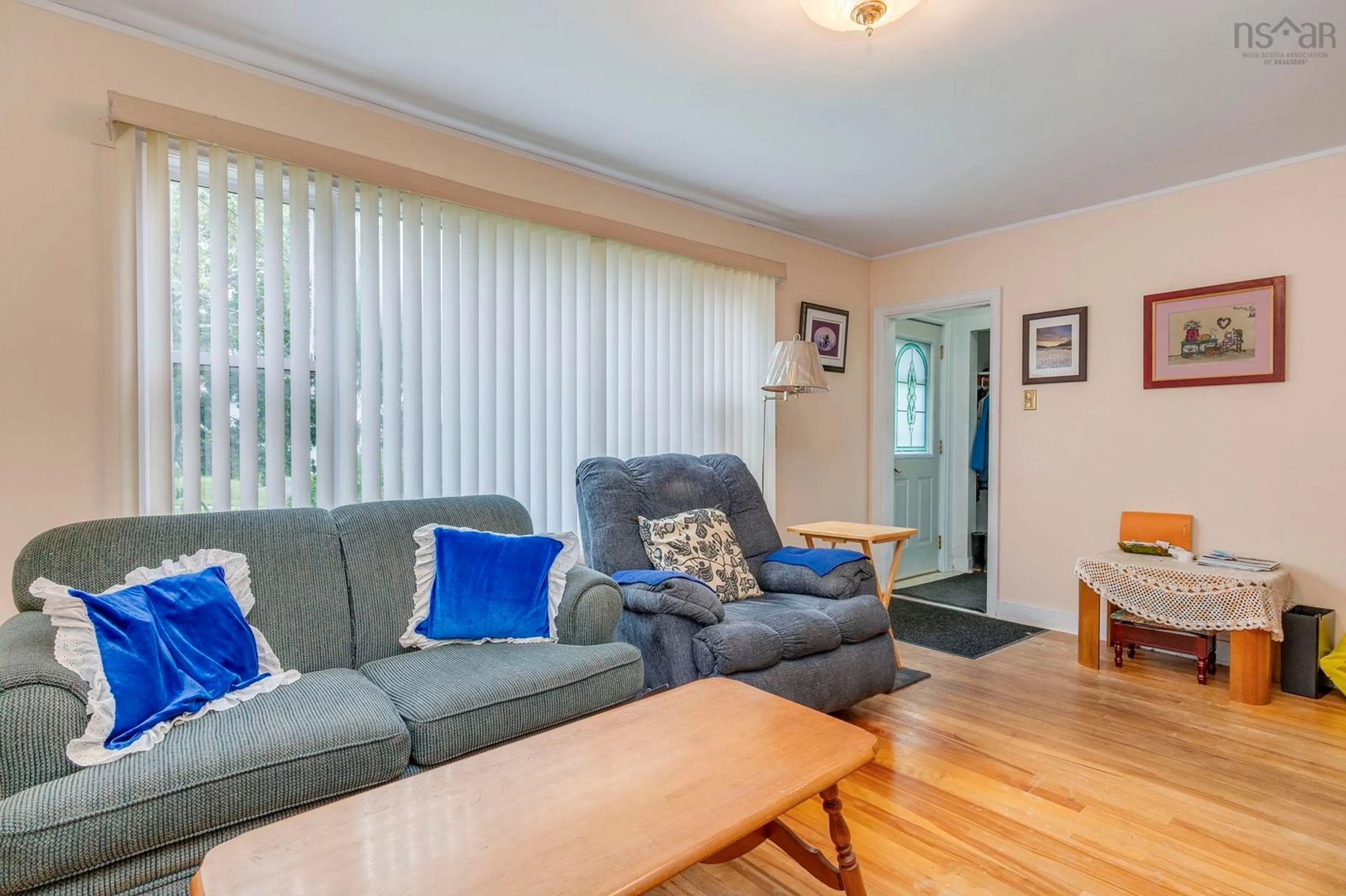 Living room with furniture, wood/laminate floor for 31 Auburn Ave, Halifax Nova Scotia B3R 1K4