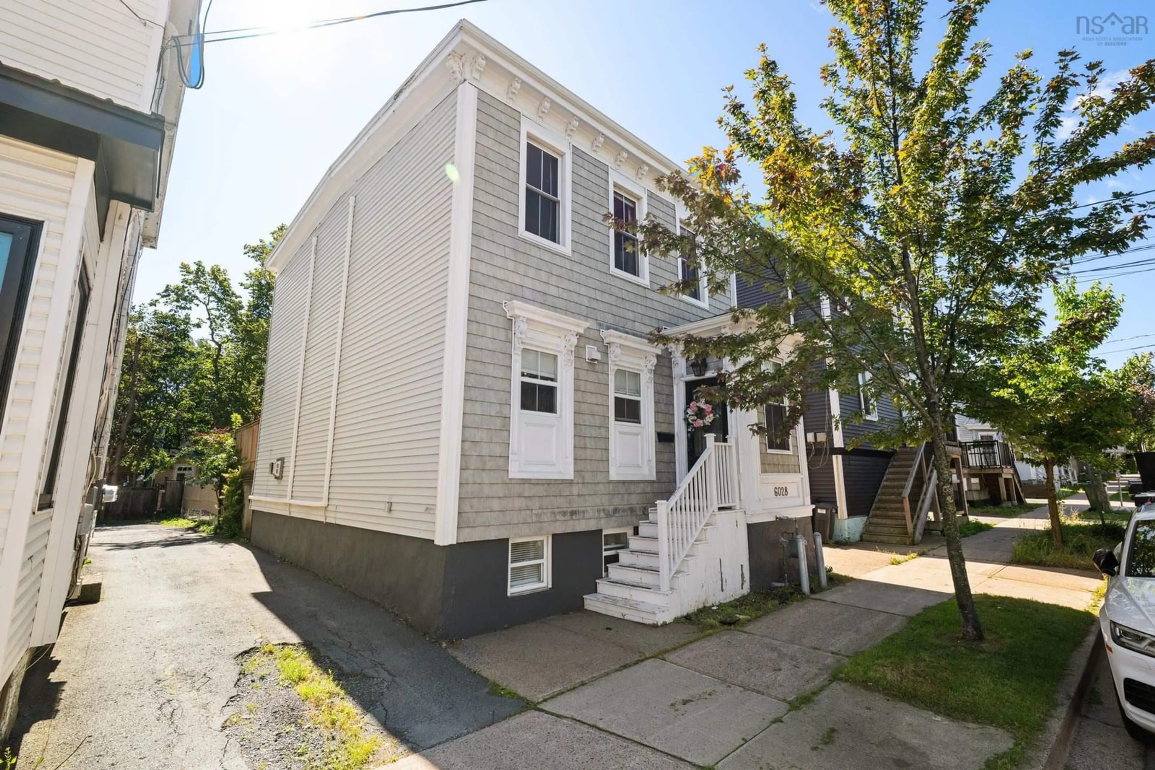 Home with vinyl exterior material, street for 6028/6030 Cunard St, Halifax Nova Scotia B3K 1E5