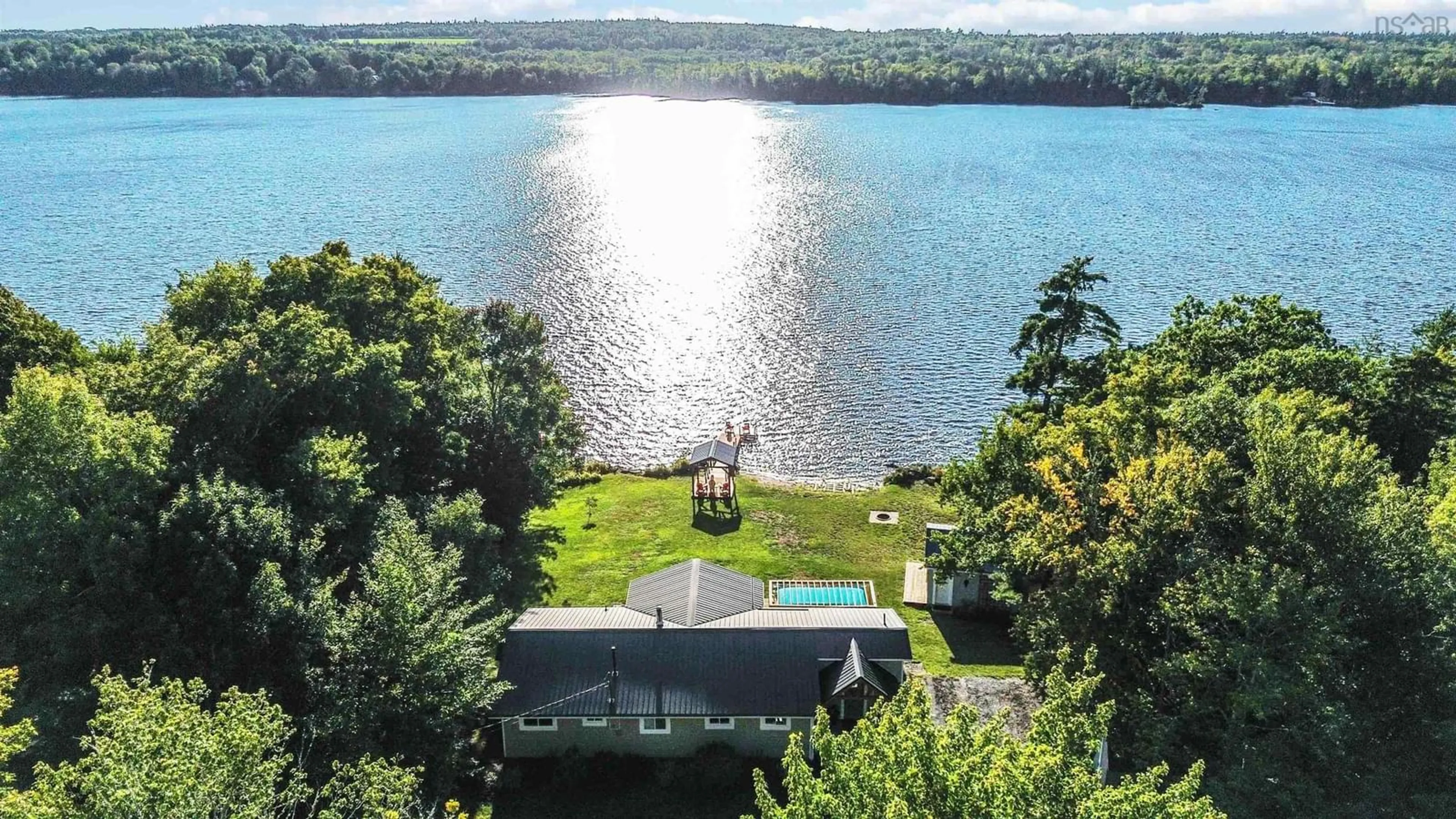 A pic from outside/outdoor area/front of a property/back of a property/a pic from drone, water/lake/river/ocean view for 131 Meadow Lane, Murphy Lake Nova Scotia B4N 1G9