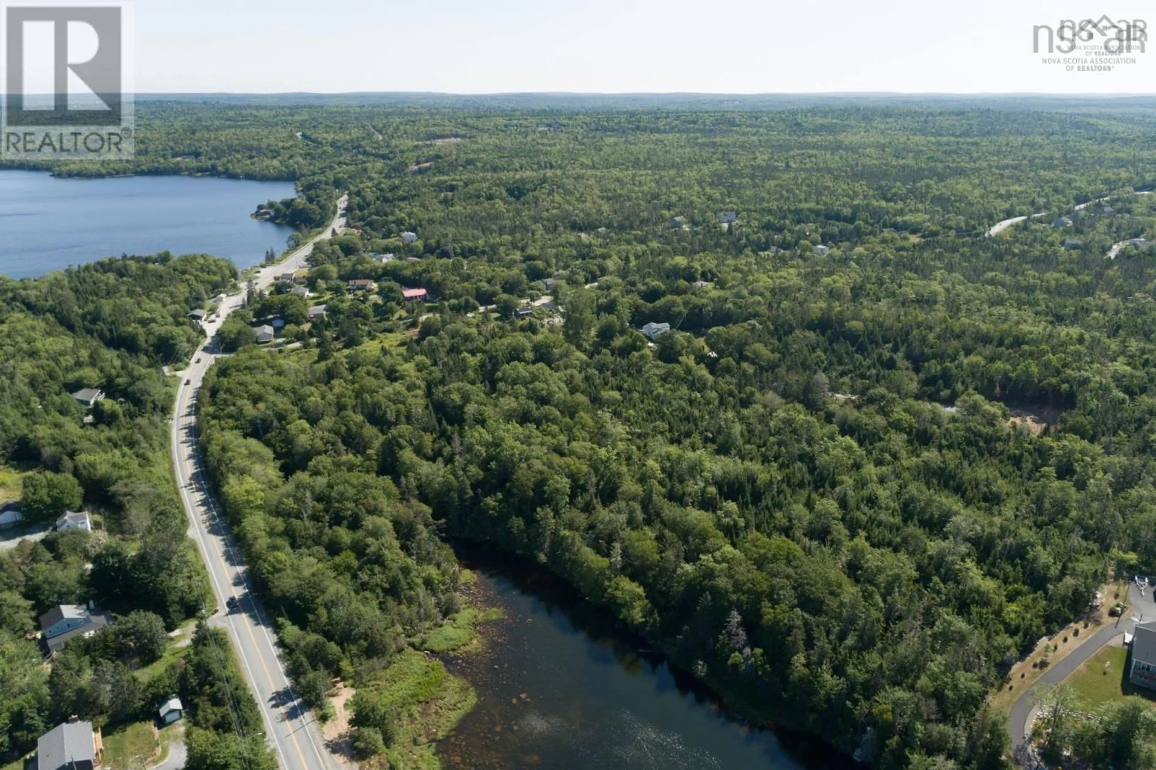 A pic from outside/outdoor area/front of a property/back of a property/a pic from drone, water/lake/river/ocean view for 8 Faith Lane #Lot, Whites Lake Nova Scotia B3T 1W3