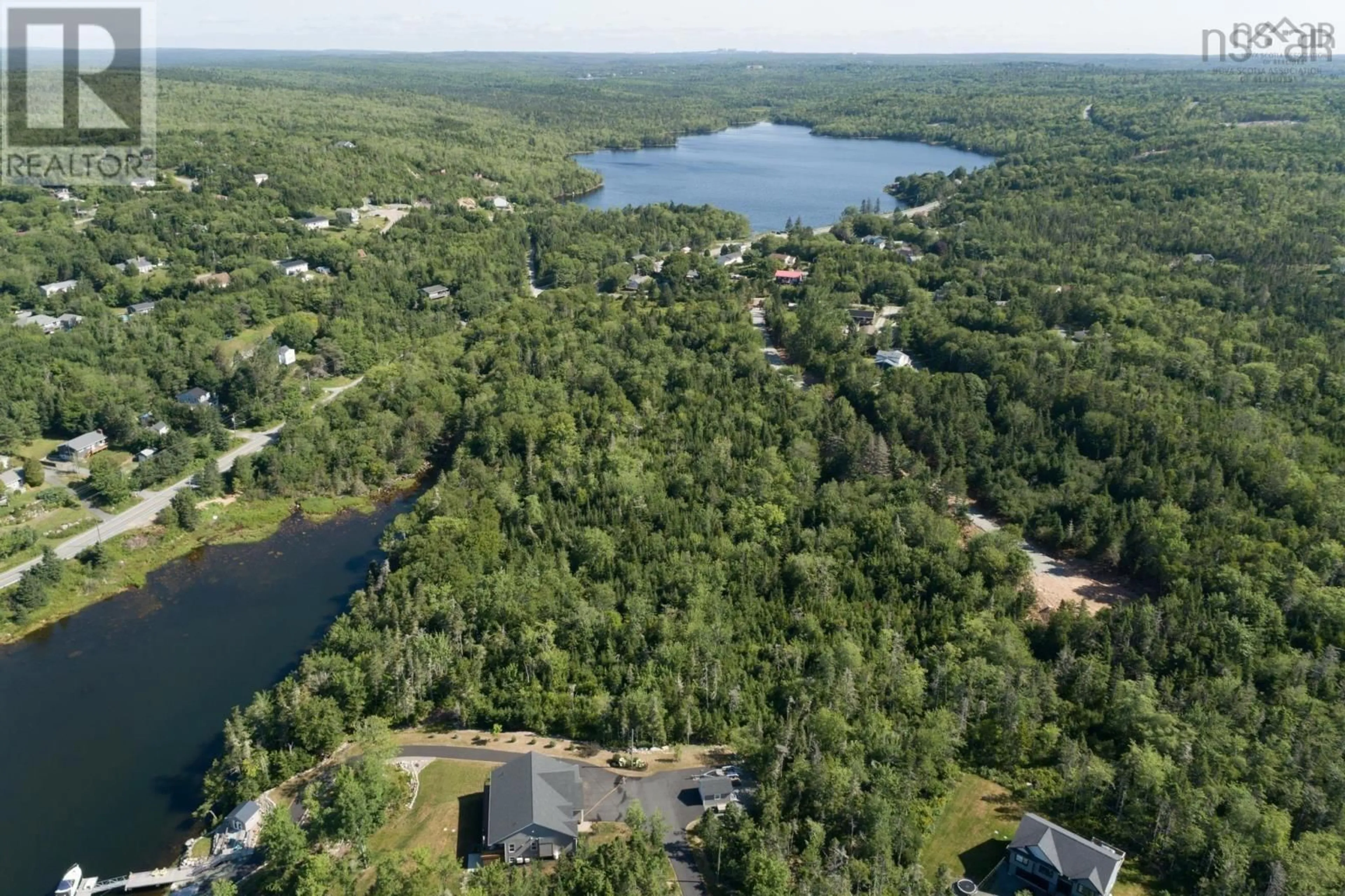 A pic from outside/outdoor area/front of a property/back of a property/a pic from drone, water/lake/river/ocean view for 8 Faith Lane #Lot, Whites Lake Nova Scotia B3T 1W3