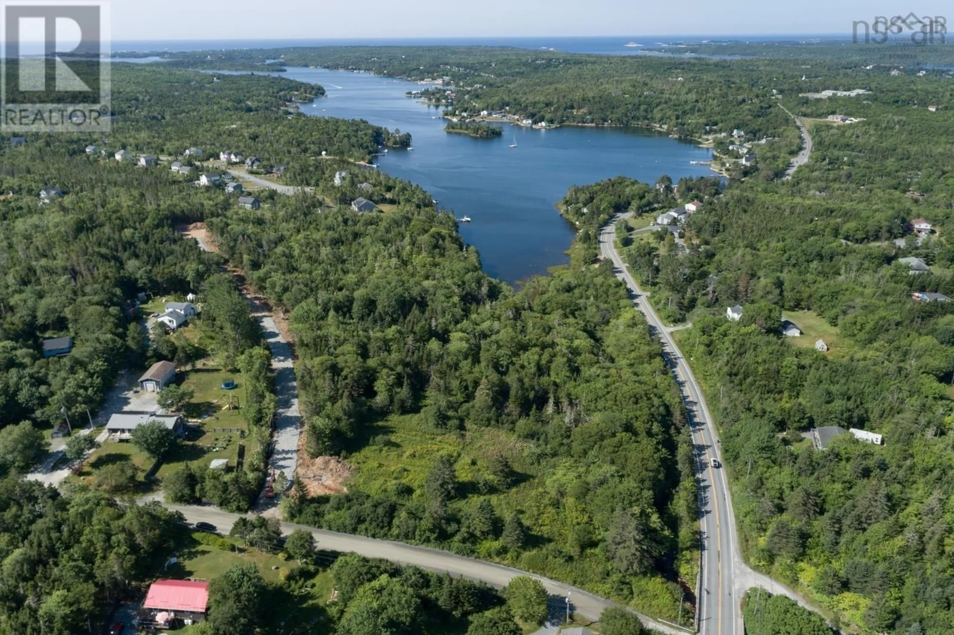 A pic from outside/outdoor area/front of a property/back of a property/a pic from drone, water/lake/river/ocean view for 8 Faith Lane #Lot, Whites Lake Nova Scotia B3T 1W3