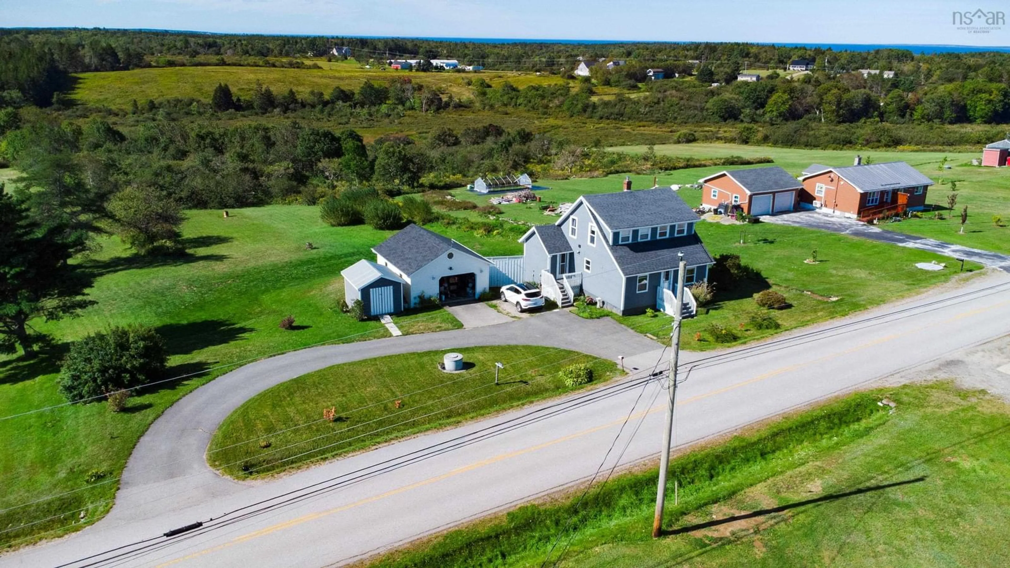 A pic from outside/outdoor area/front of a property/back of a property/a pic from drone, water/lake/river/ocean view for 824 Saulnierville Road, Saulnierville Station Nova Scotia B0W 2Z0