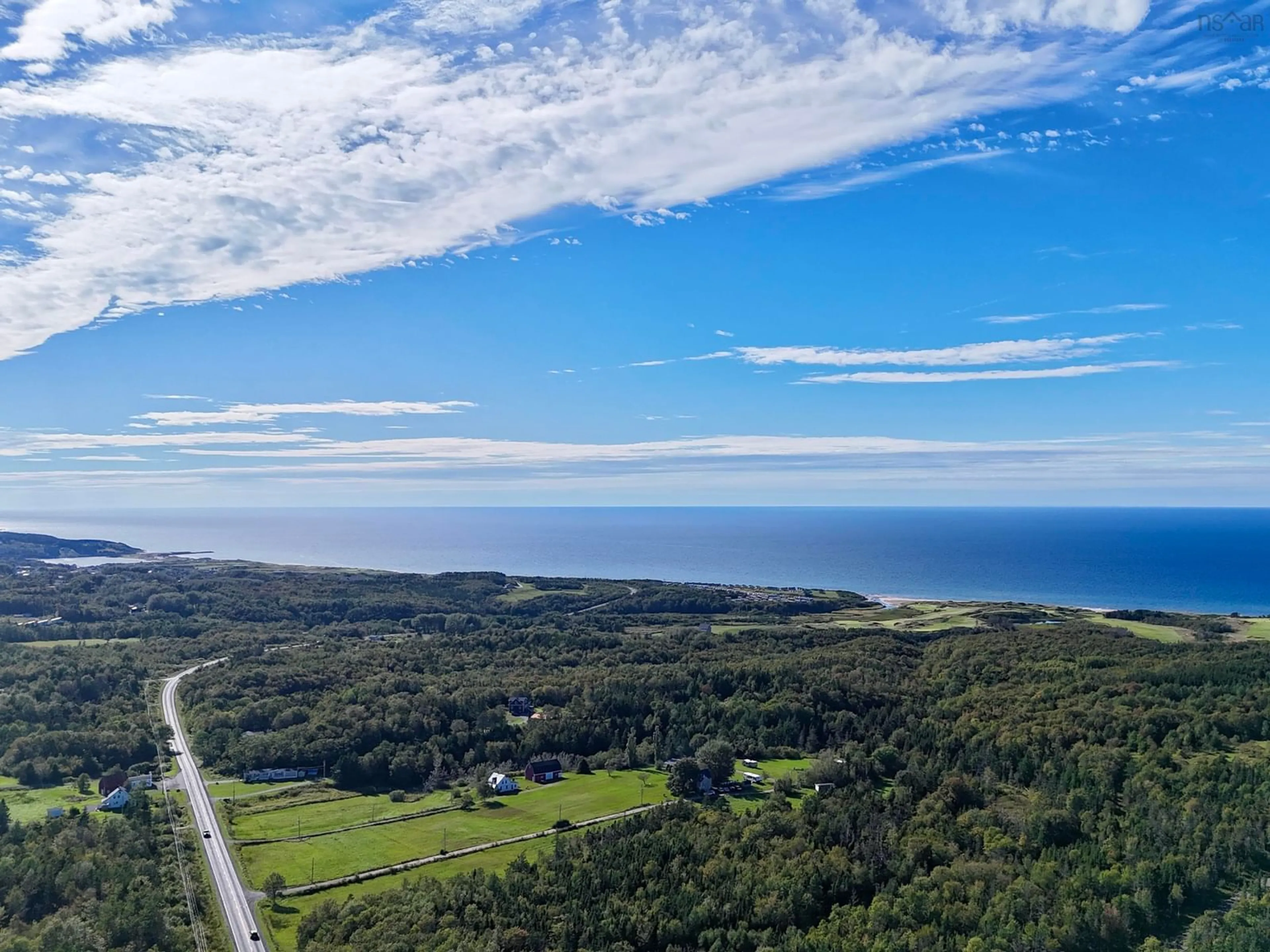 A pic from outside/outdoor area/front of a property/back of a property/a pic from drone, water/lake/river/ocean view for 165552 Highway 19, Inverside Nova Scotia B0E 1N0
