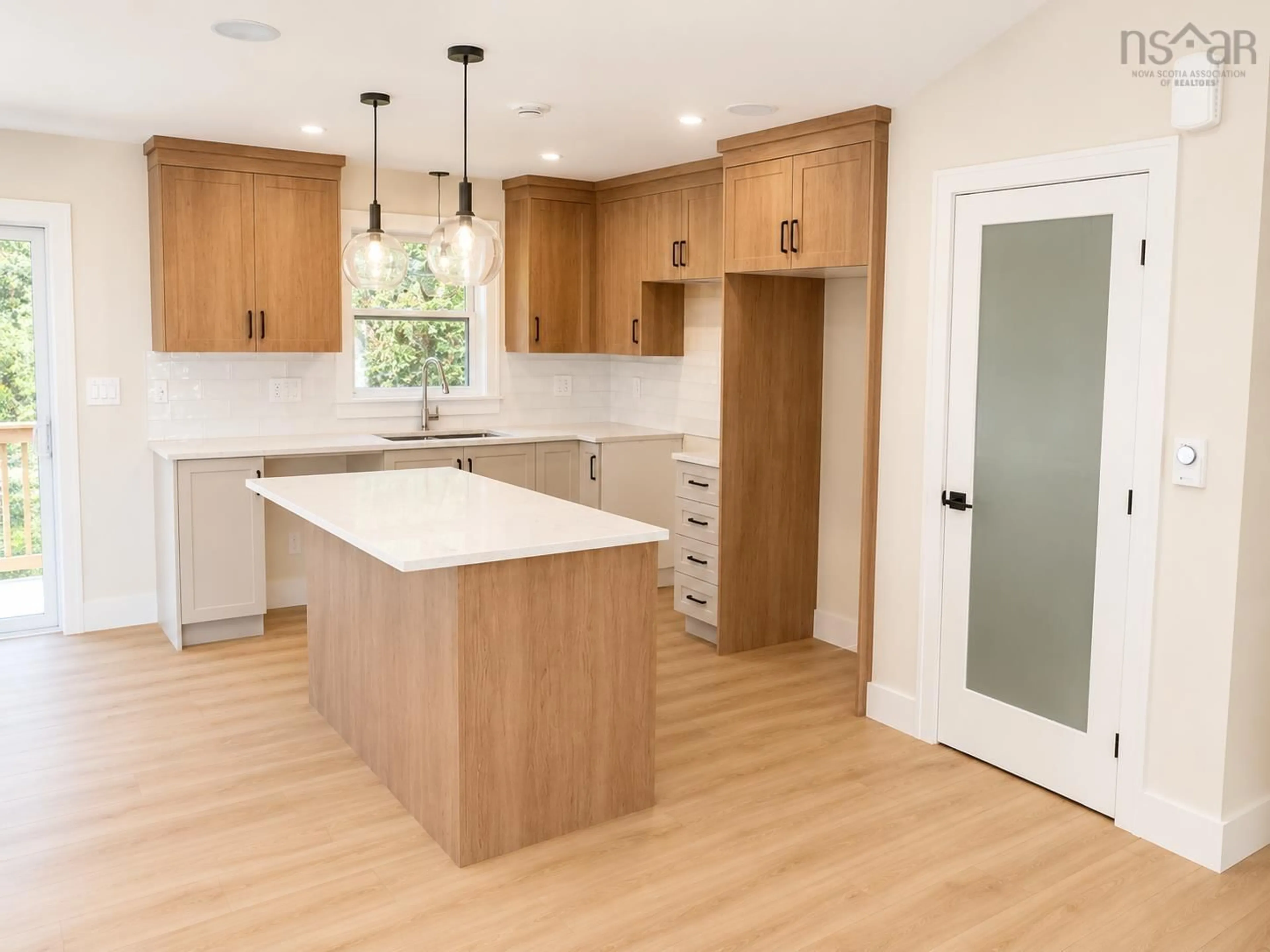 Open concept kitchen, wood/laminate floor for 227 Bondi Dr, Middle Sackville Nova Scotia B0N 1Z0