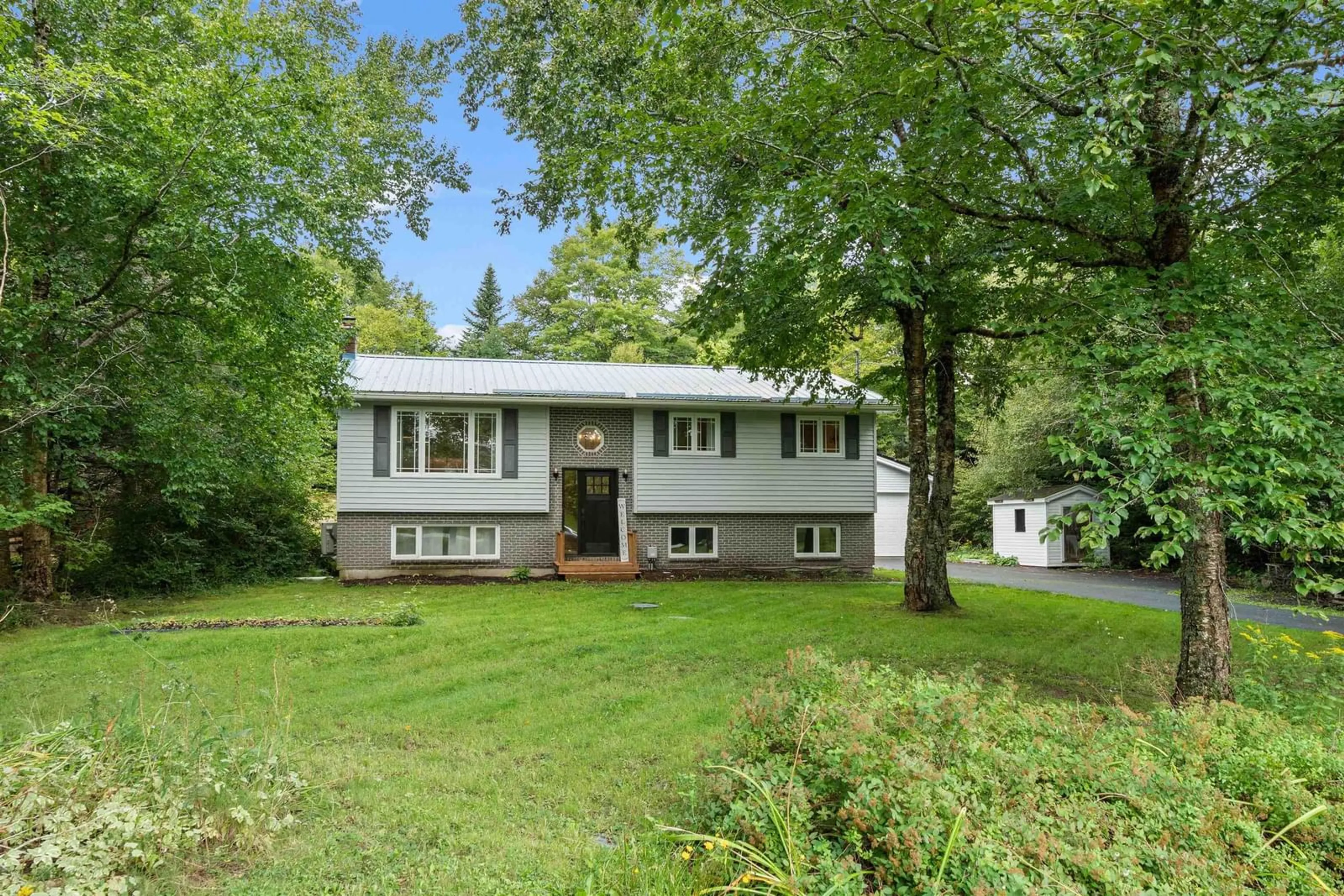 Home with vinyl exterior material, street for 7 Brian Andrew St, Lake Echo Nova Scotia B3E 1M4