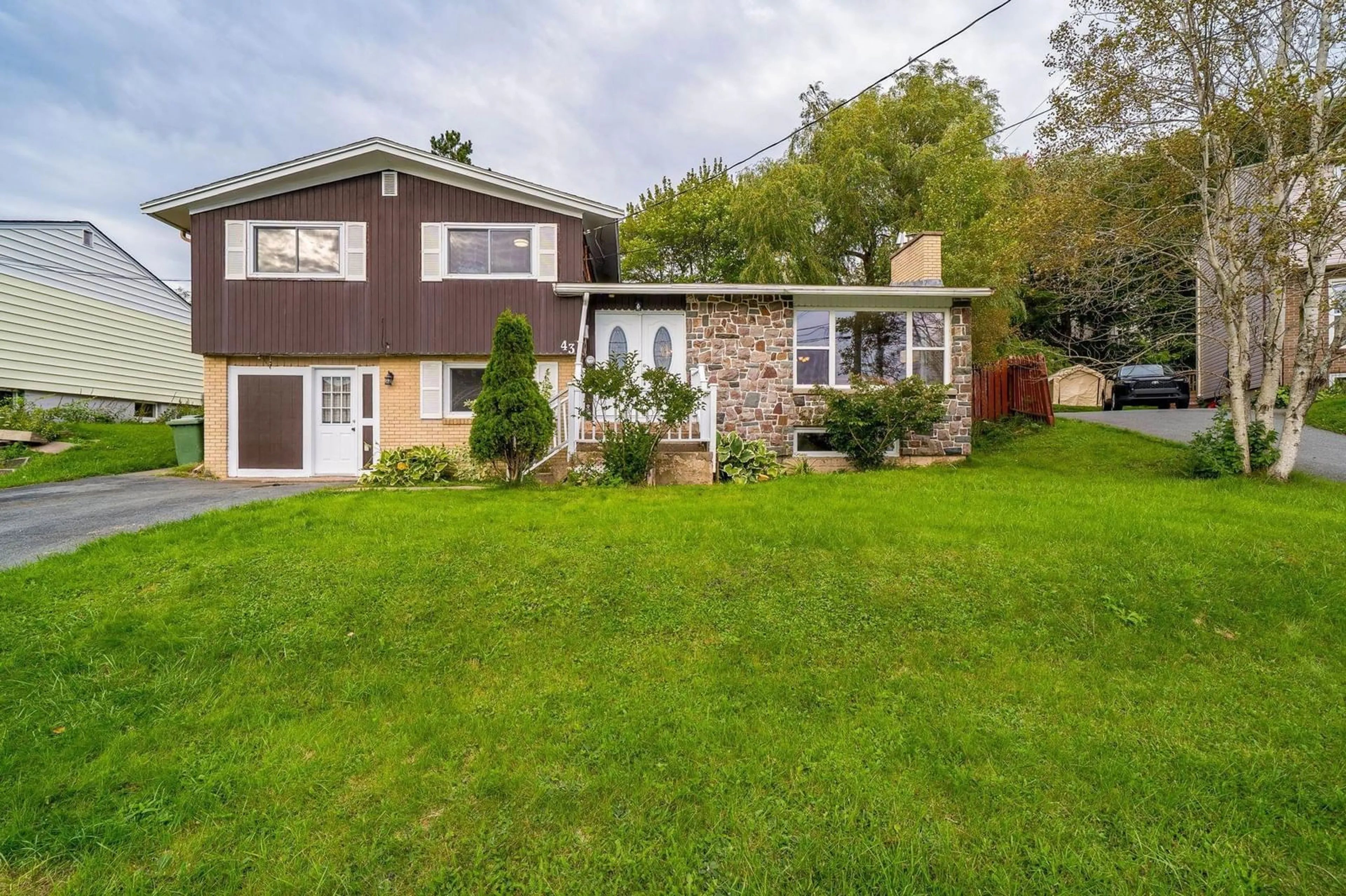 A pic from outside/outdoor area/front of a property/back of a property/a pic from drone, street for 43 Lynn Dr, Dartmouth Nova Scotia B2Y 3V8