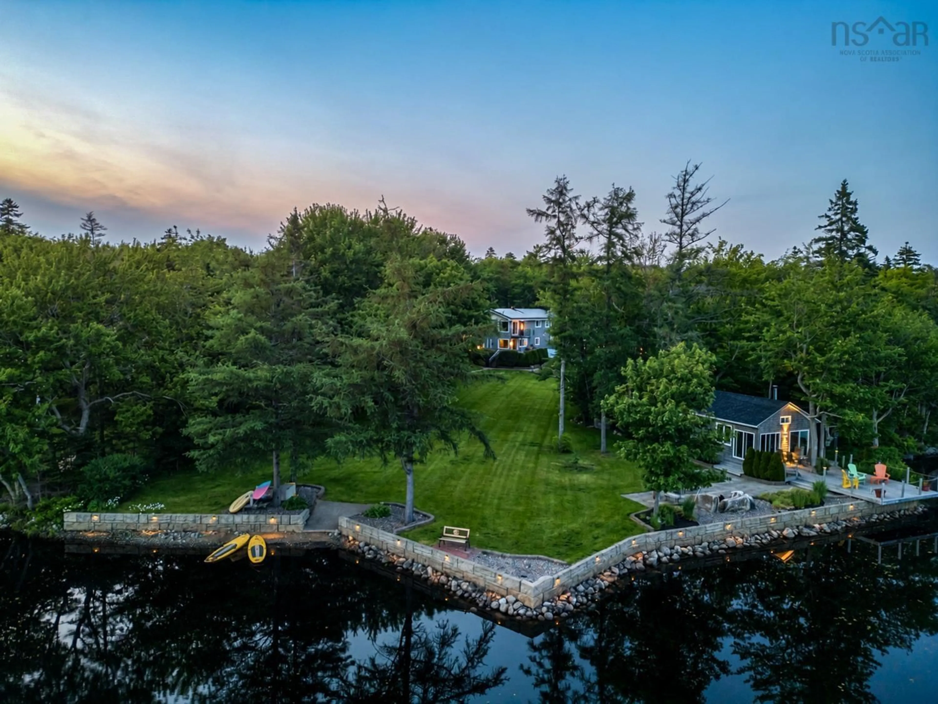 A pic from outside/outdoor area/front of a property/back of a property/a pic from drone, water/lake/river/ocean view for 121 Hubley Mill Lake Rd, Upper Tantallon Nova Scotia B3Z 1E8