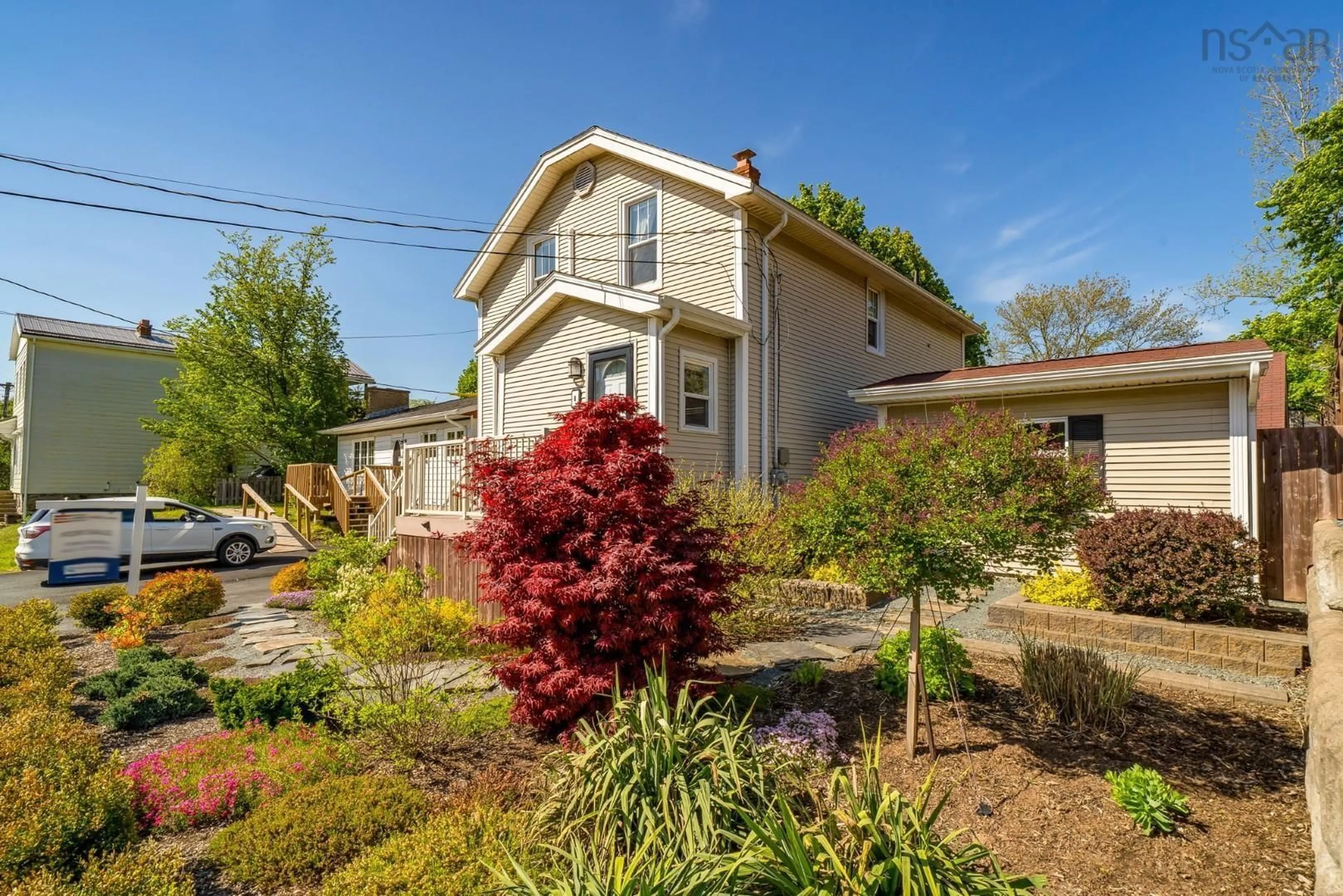 A pic from outside/outdoor area/front of a property/back of a property/a pic from drone, street for 8 Eaton Ave, Dartmouth Nova Scotia B2Y 2X5