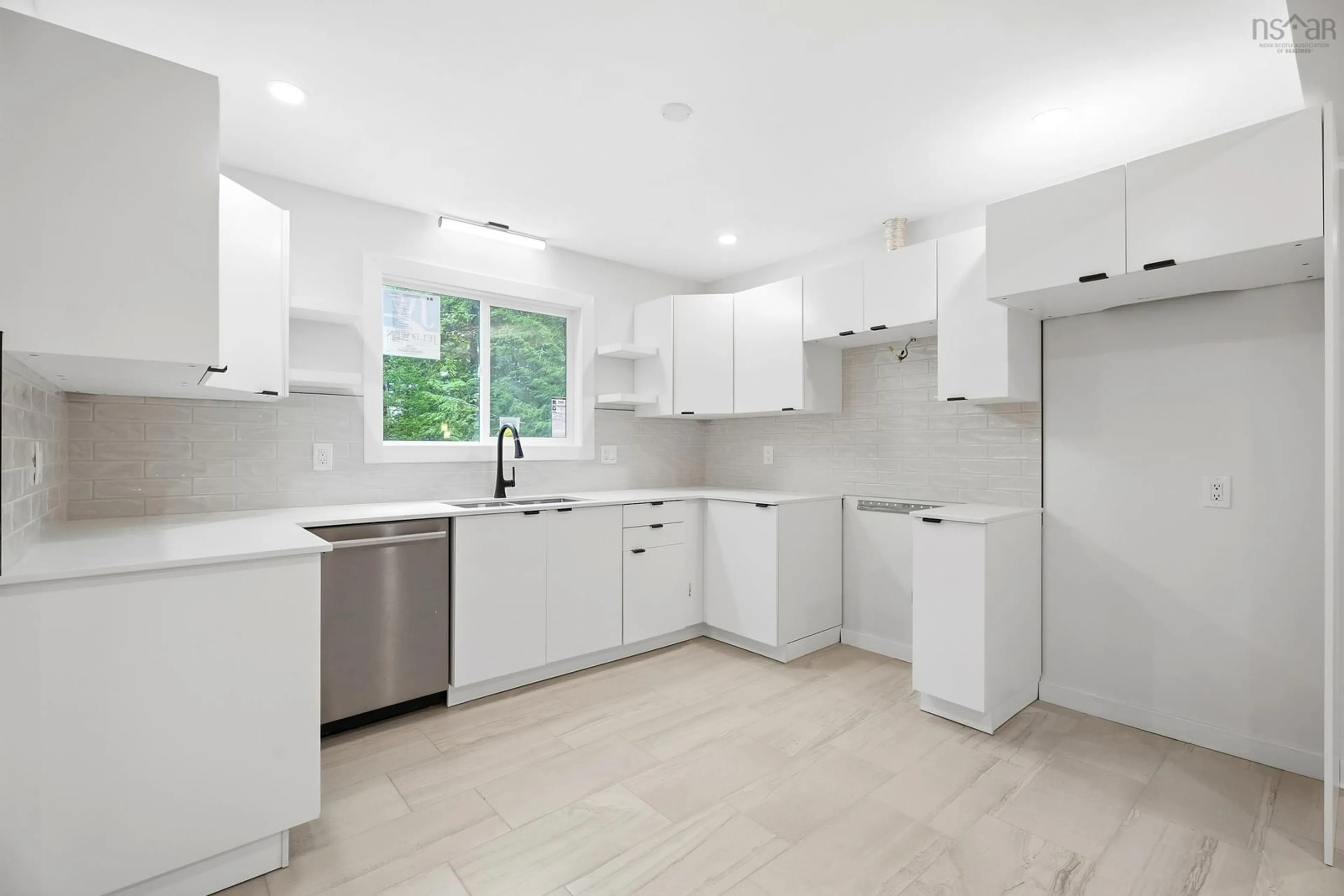 Open concept kitchen, ceramic/tile floor for 26 Village Cres, Bedford Nova Scotia B4A 1J2