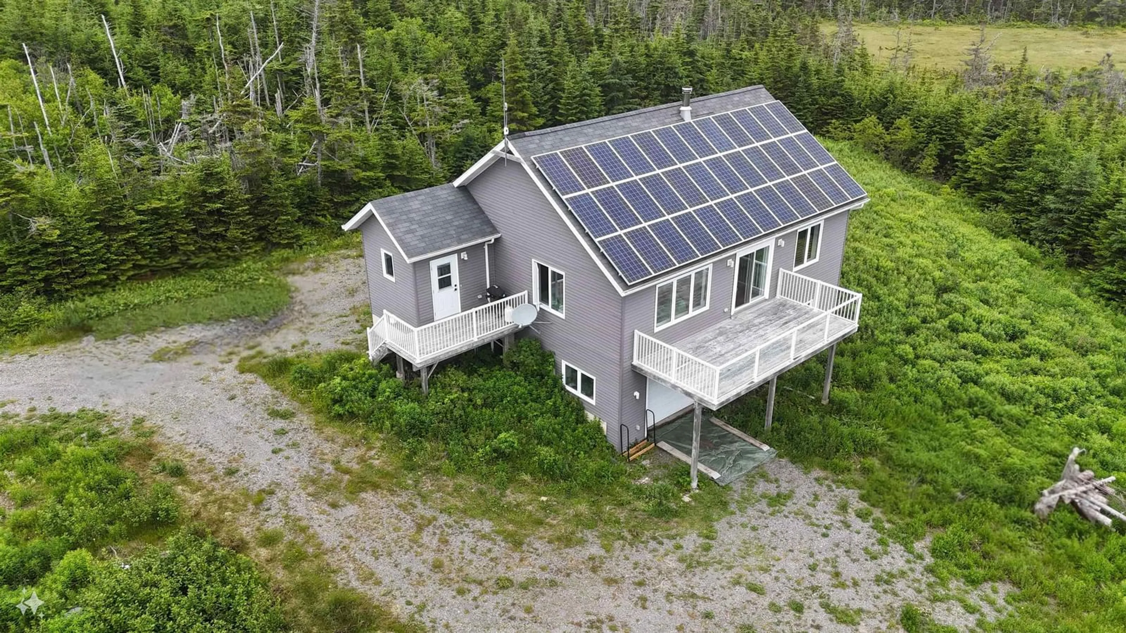A pic from outside/outdoor area/front of a property/back of a property/a pic from drone, building for 4381 St. Peter's Fourchu Rd, Grand River Nova Scotia B0E 1M0