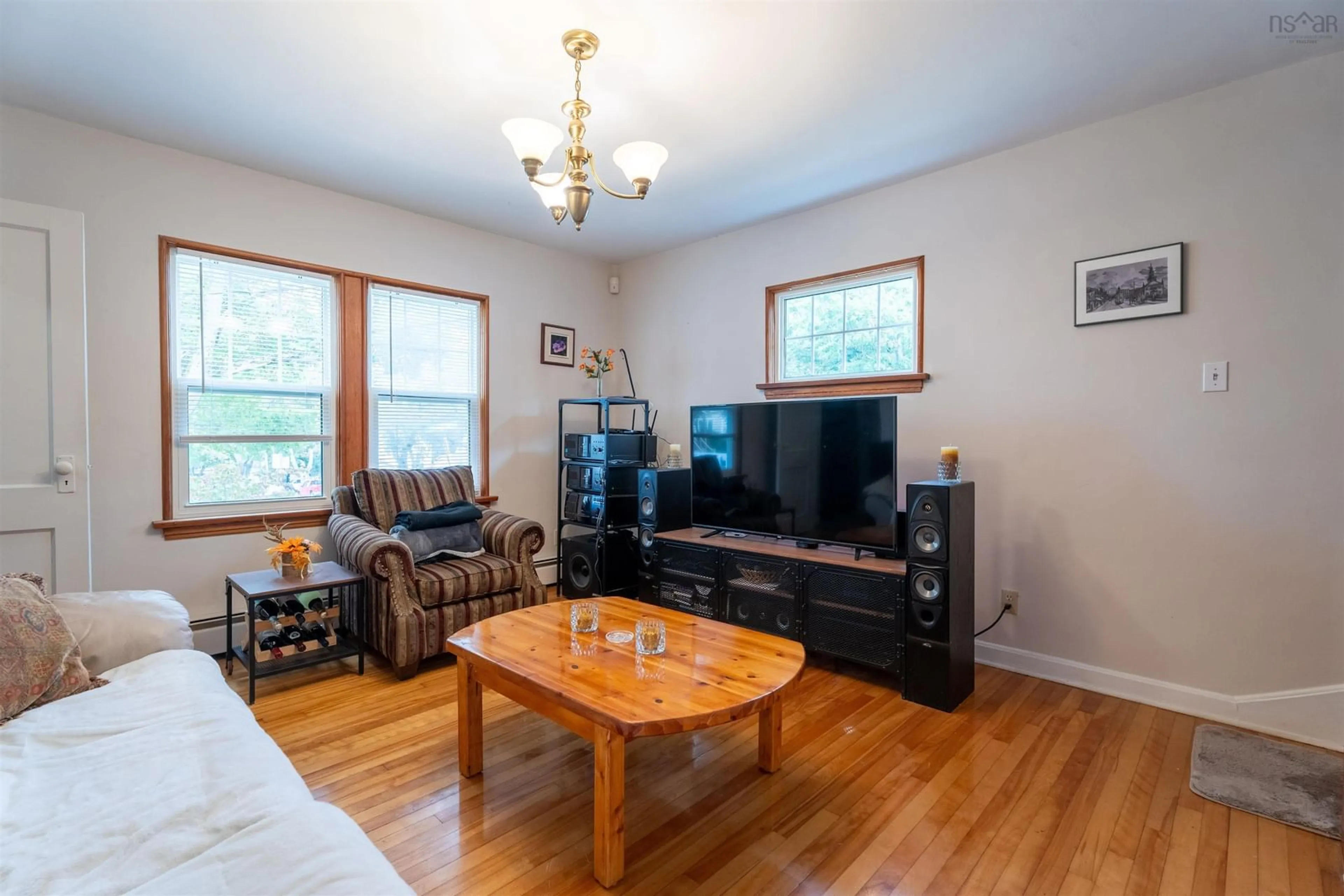 Living room with furniture, wood/laminate floor for 3636 Leaman St, Halifax Nova Scotia B3K 4A1