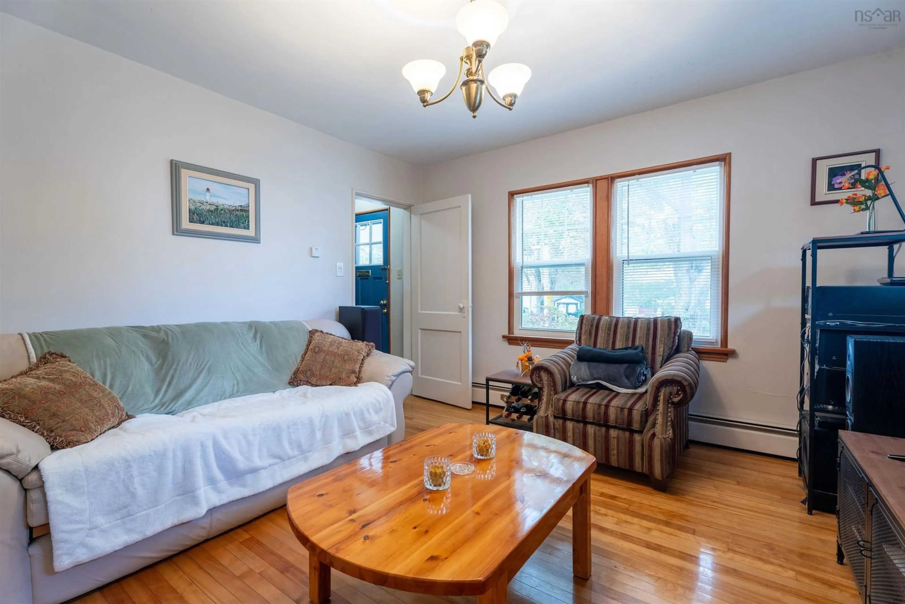 Living room with furniture, wood/laminate floor for 3636 Leaman St, Halifax Nova Scotia B3K 4A1
