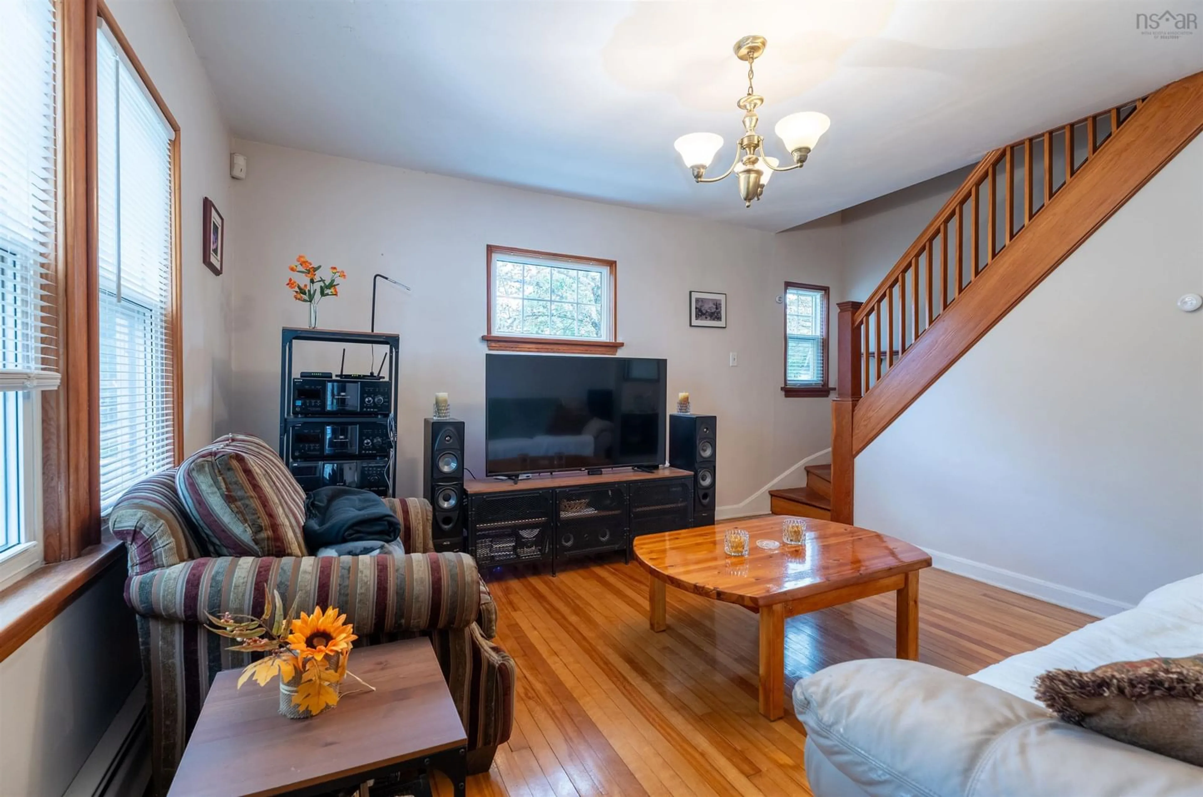 Living room with furniture, wood/laminate floor for 3636 Leaman St, Halifax Nova Scotia B3K 4A1