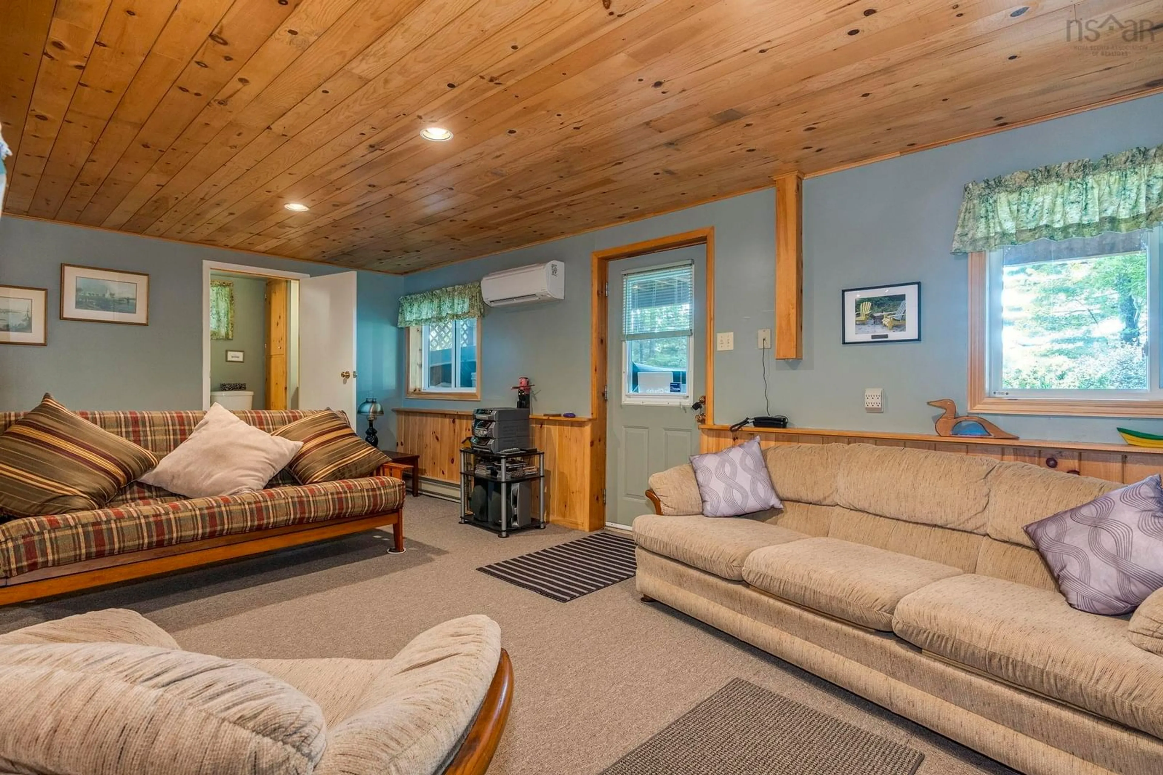 Living room with furniture, wood/laminate floor for 43 Balsam Rd, Barss Corner Nova Scotia B0R 1H0