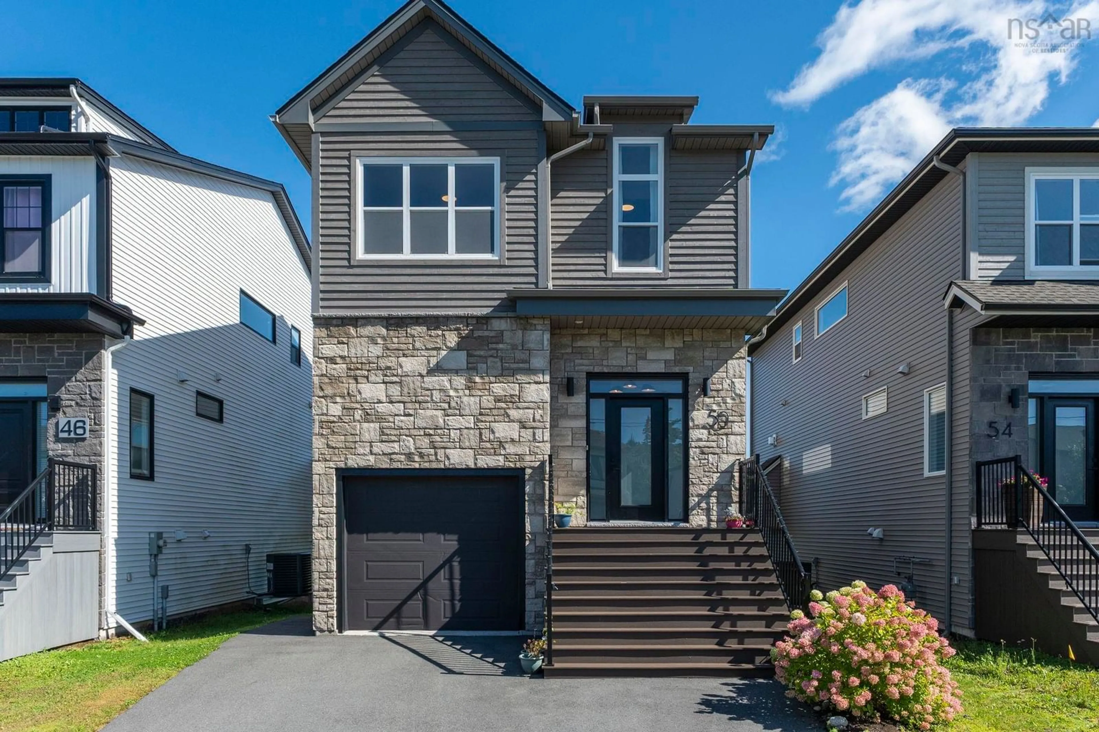 Home with brick exterior material, street for 50 Breaktrail Drive, Bedford Nova Scotia B4B 2J7