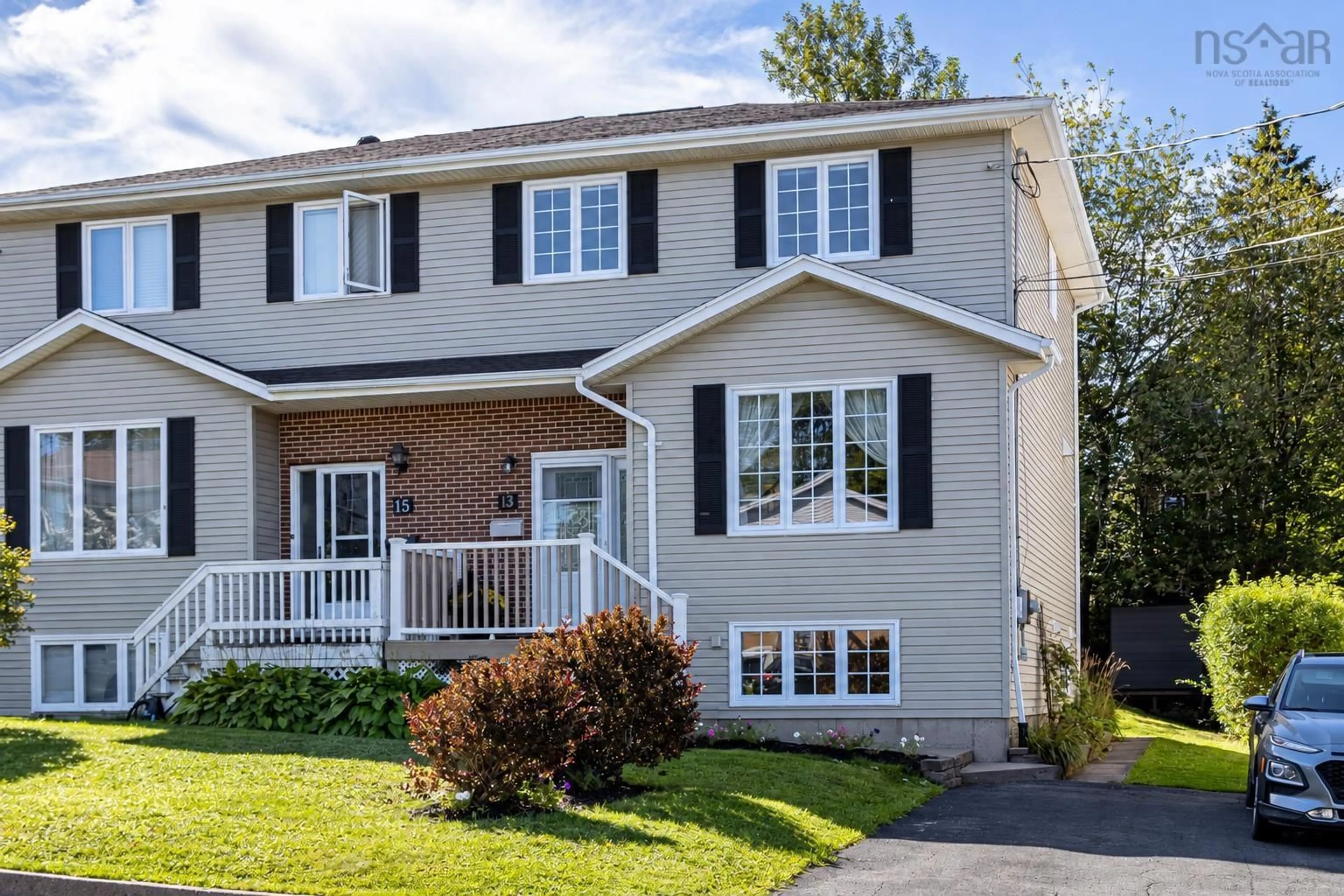 Home with vinyl exterior material, street for 13 Herbert Rd, Halifax Nova Scotia B3N 3C7