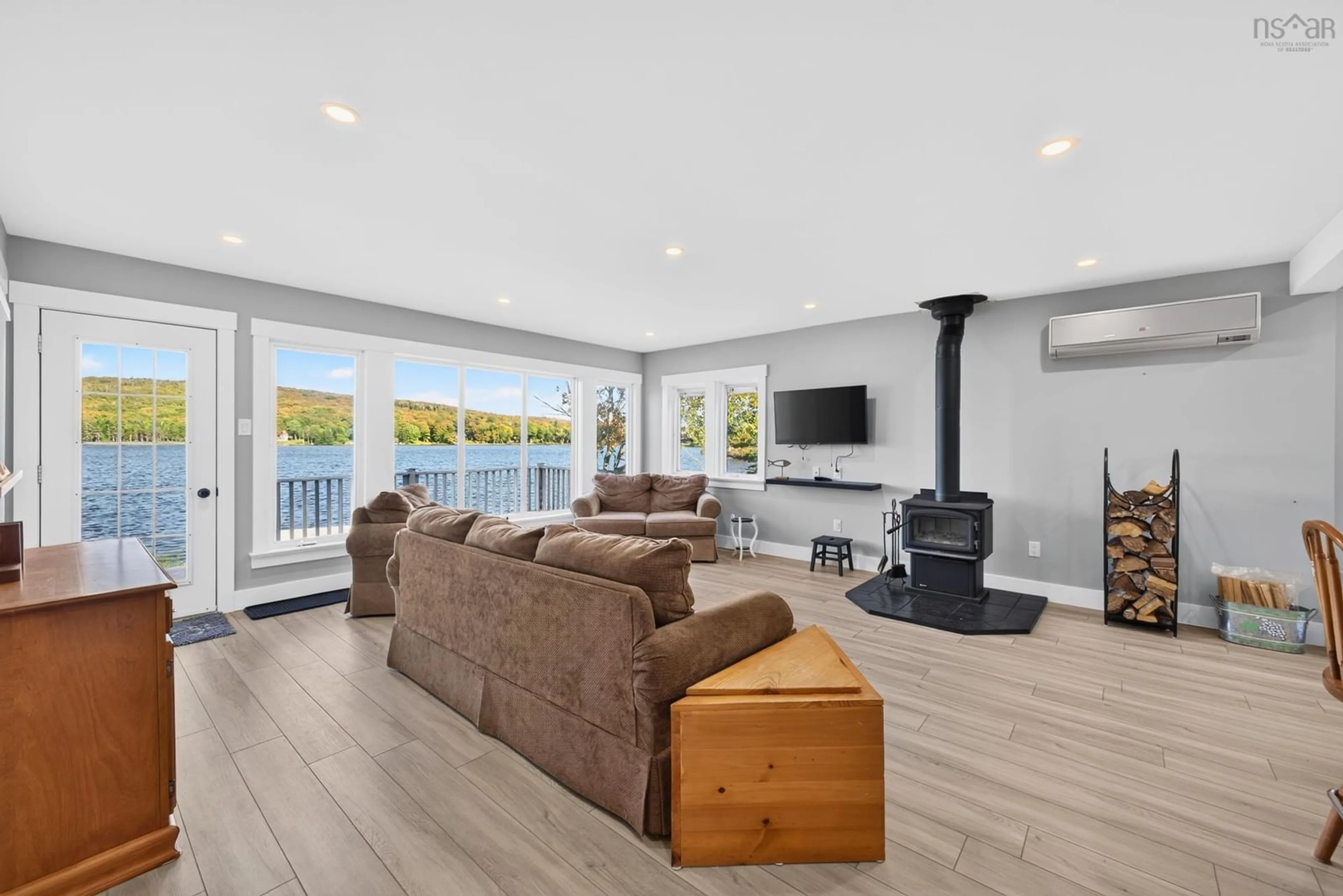Living room with furniture, wood/laminate floor for 106 Westchester Rd, Sutherland Lake Nova Scotia B0M 1G0