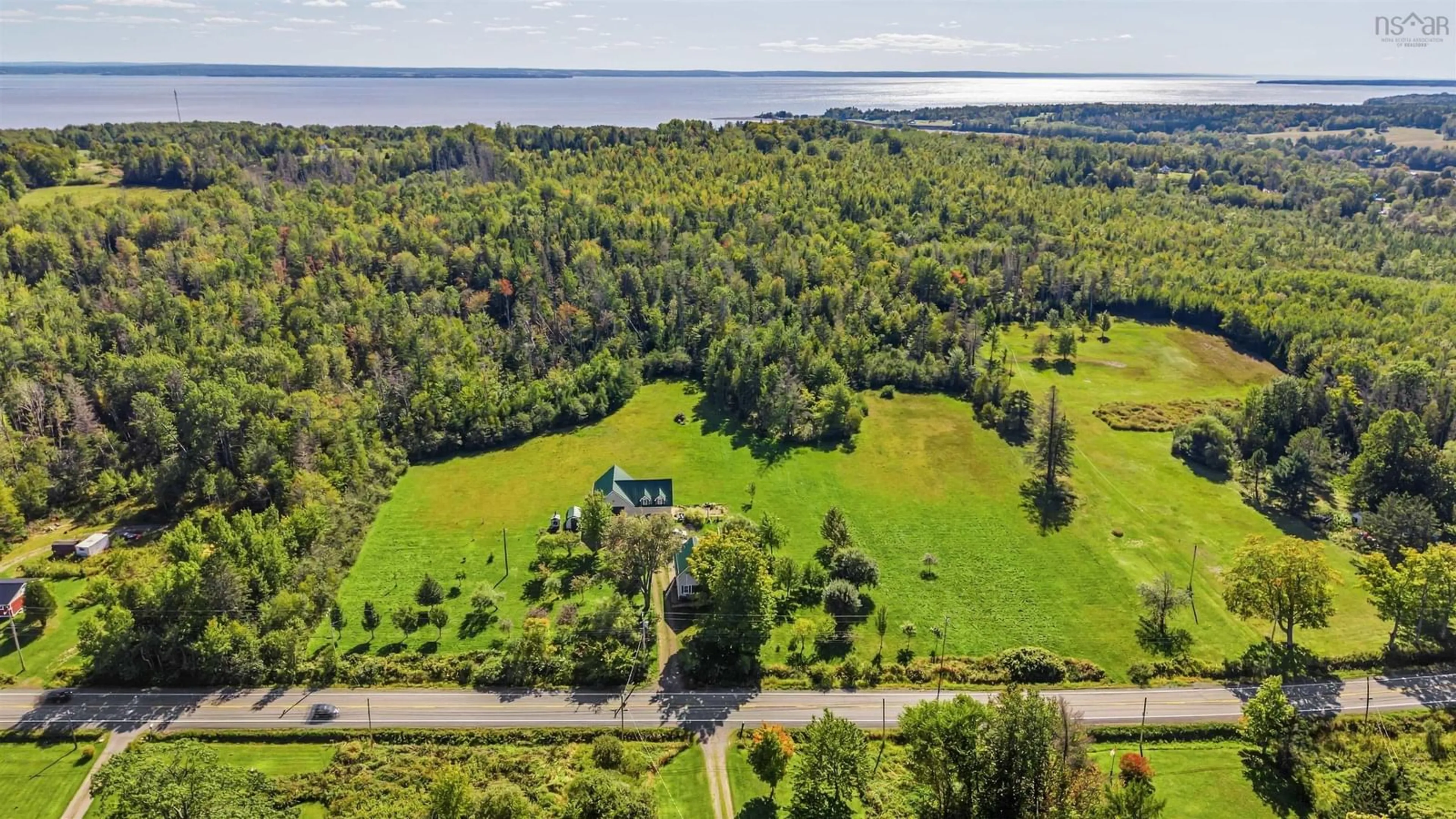 A pic from outside/outdoor area/front of a property/back of a property/a pic from drone, water/lake/river/ocean view for 5834 Highway 2, Bass River Nova Scotia B0M 1B0