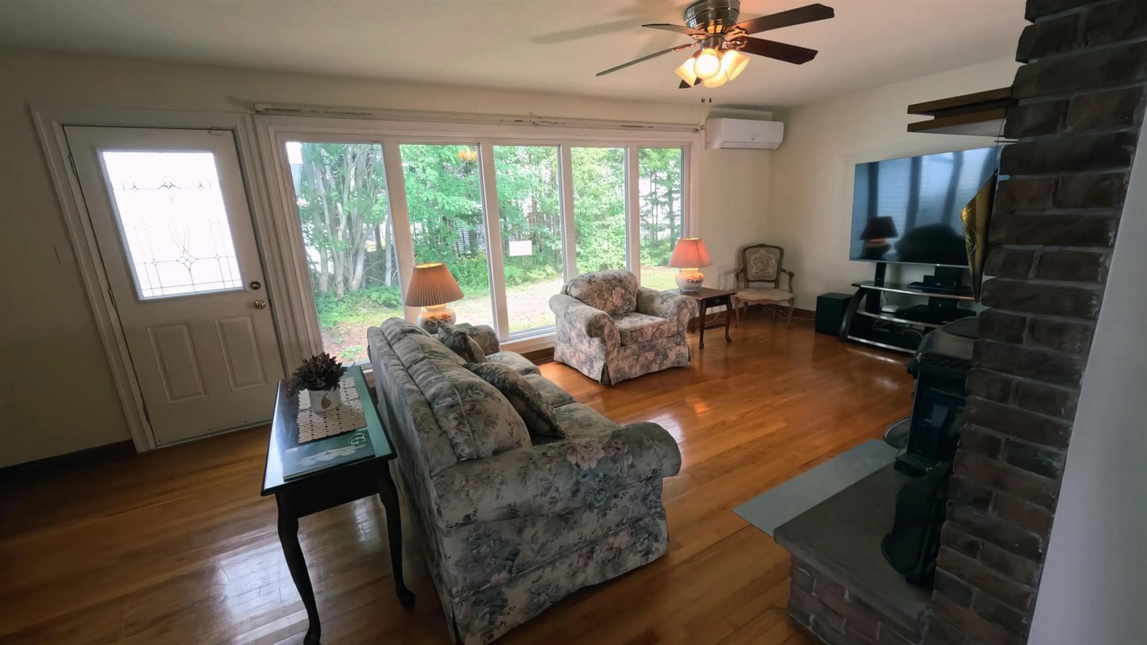 Living room with furniture, wood/laminate floor for 17 Maple Dr, Timberlea Nova Scotia B3T 1C2