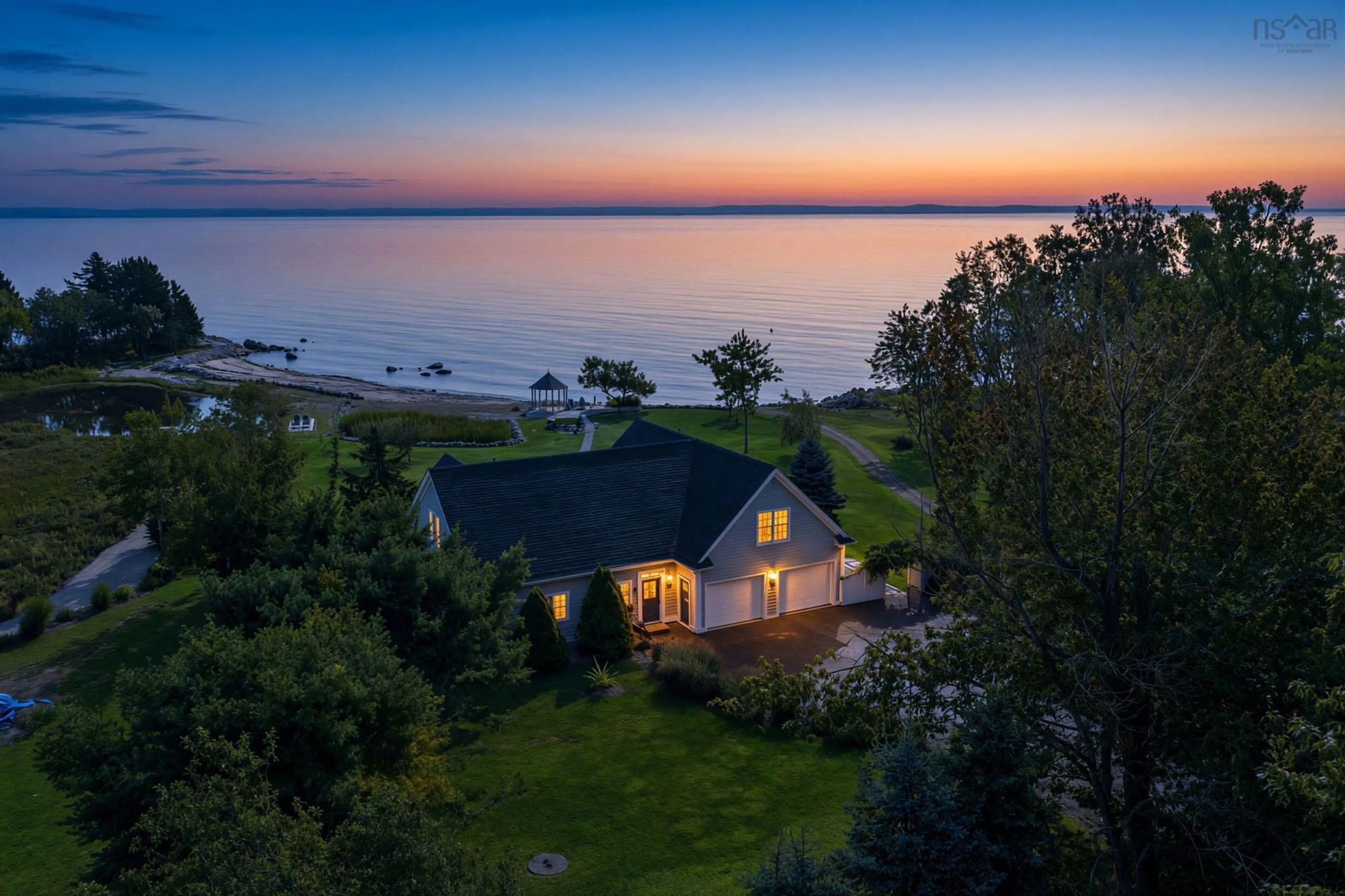 A pic from outside/outdoor area/front of a property/back of a property/a pic from drone, water/lake/river/ocean view for 467 329 Hwy, Fox Point Nova Scotia B0J 1T0