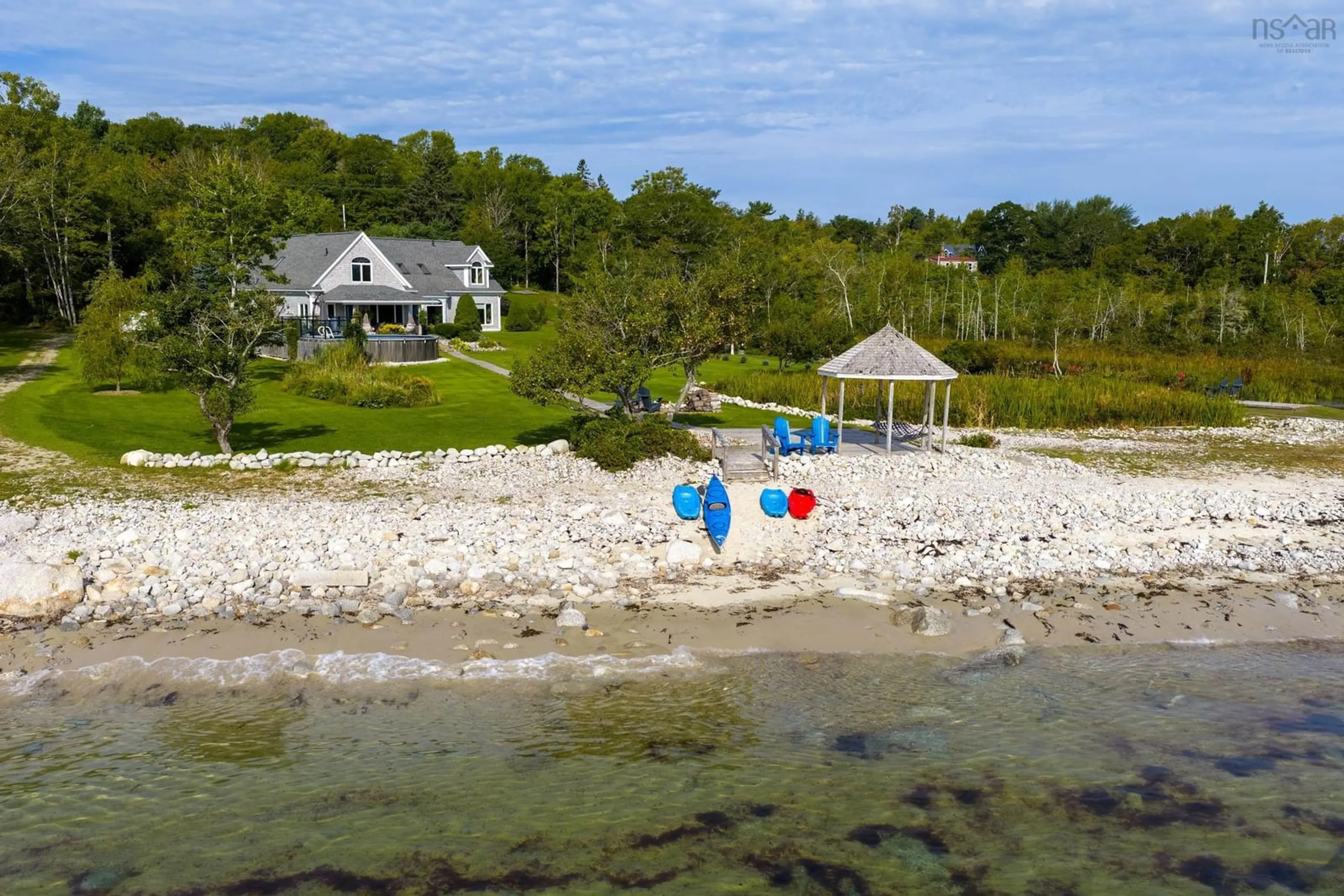 A pic from outside/outdoor area/front of a property/back of a property/a pic from drone, water/lake/river/ocean view for 467 329 Hwy, Fox Point Nova Scotia B0J 1T0