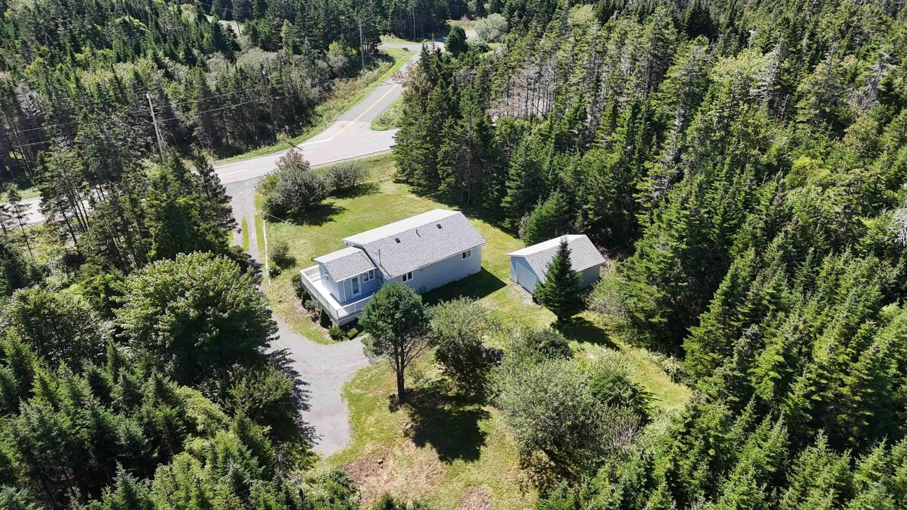 A pic from outside/outdoor area/front of a property/back of a property/a pic from drone, forest/trees view for 1015 Highway 247, Rockdale Nova Scotia B0E 3B0