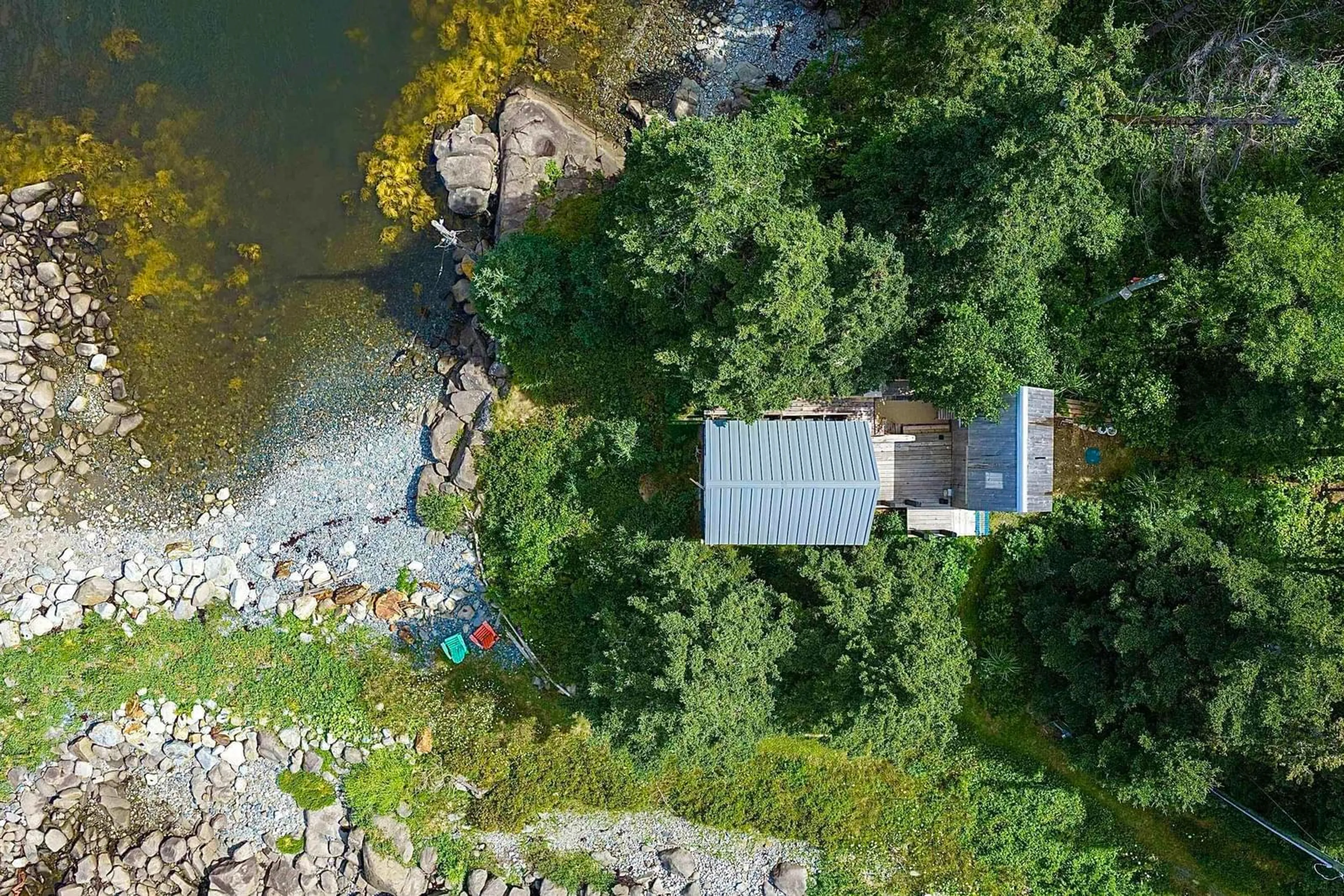 A pic from outside/outdoor area/front of a property/back of a property/a pic from drone, water/lake/river/ocean view for 61 Little Harbour Rd, Cherry Hill Nova Scotia B0J 2H0