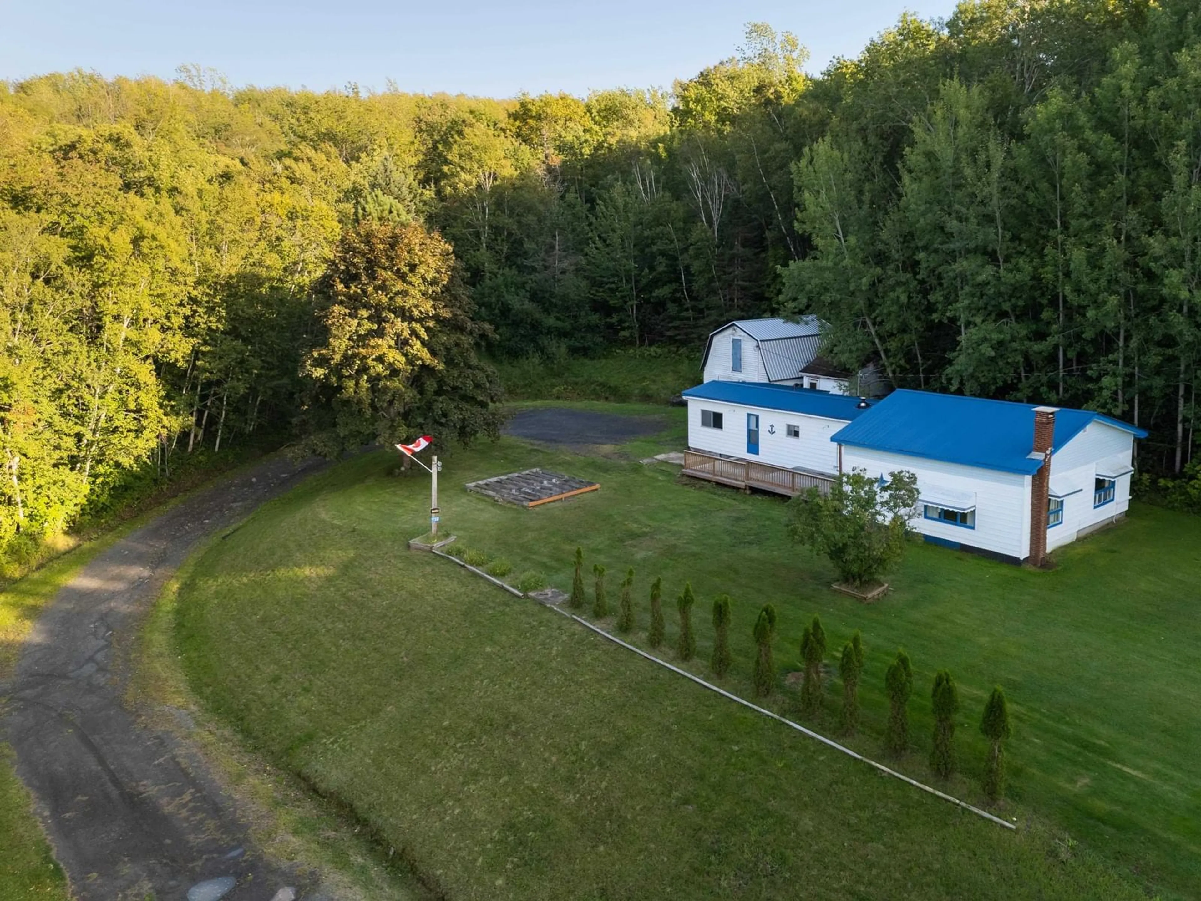 A pic from outside/outdoor area/front of a property/back of a property/a pic from drone, unknown for 732 Highway 1, Deep Brook Nova Scotia B0S 1J0