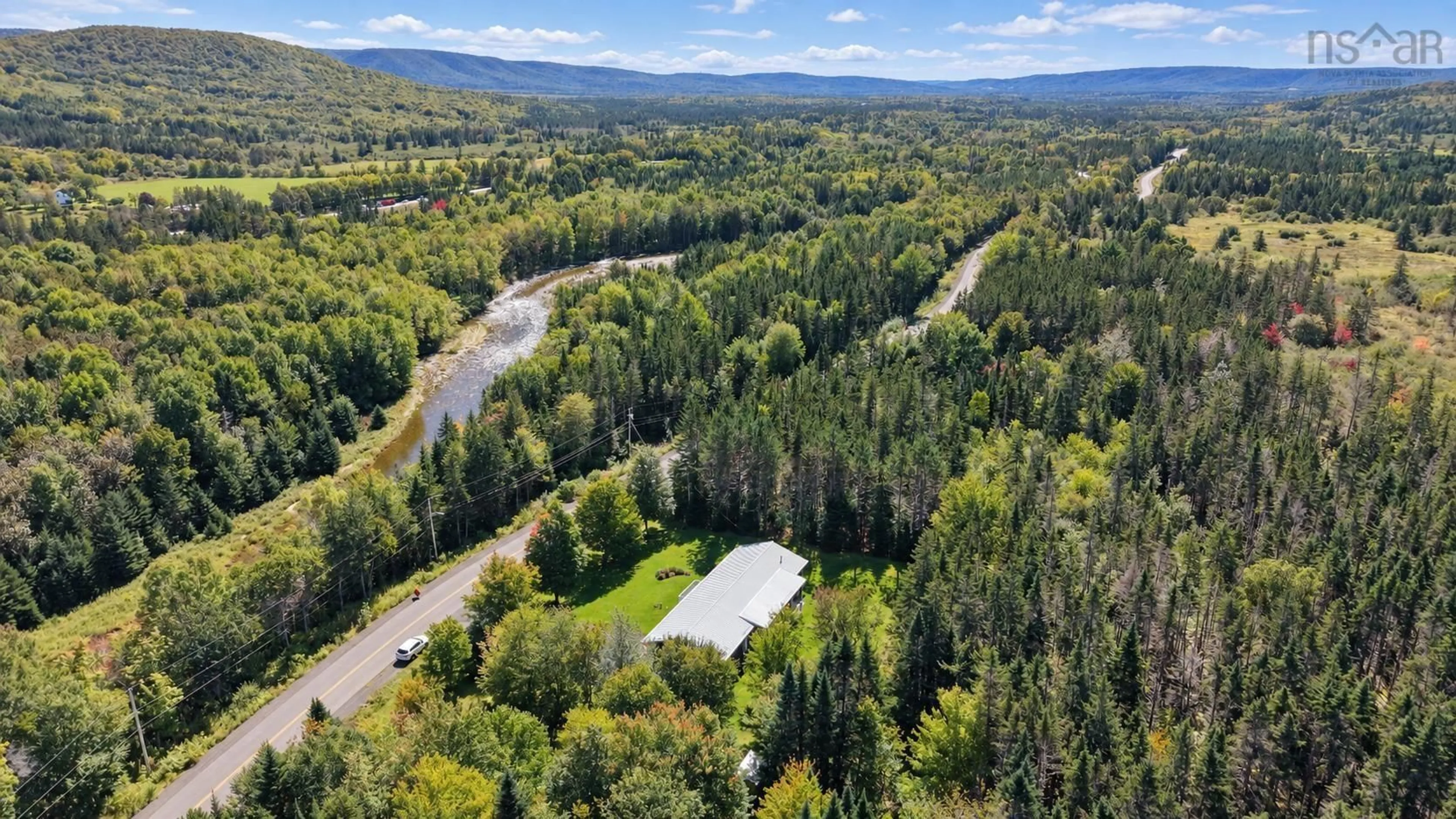 A pic from outside/outdoor area/front of a property/back of a property/a pic from drone, water/lake/river/ocean view for 102 West Side Middle River Rd, Middle River Nova Scotia B0E 1B0