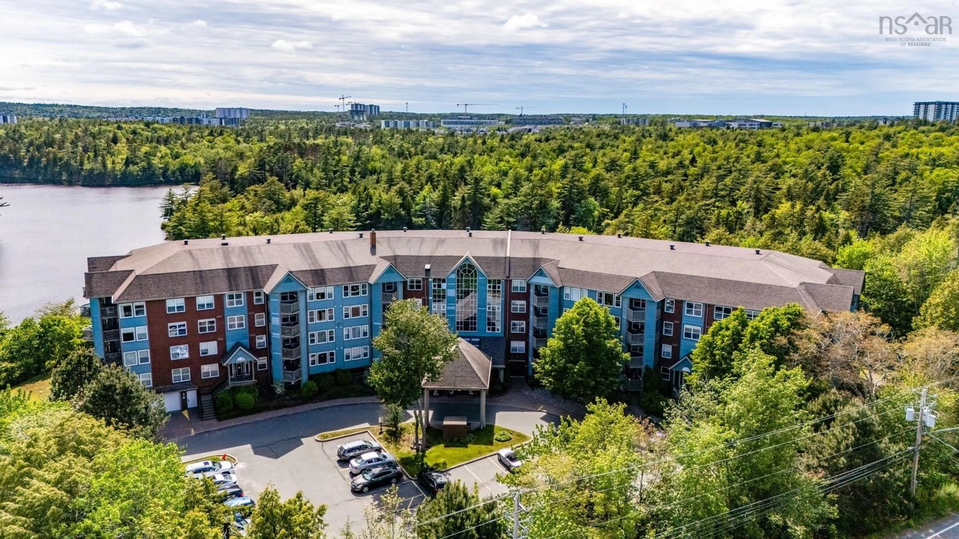 A pic from outside/outdoor area/front of a property/back of a property/a pic from drone, water/lake/river/ocean view for 2 Lake Dr #301, Bedford Nova Scotia B4A 4H7