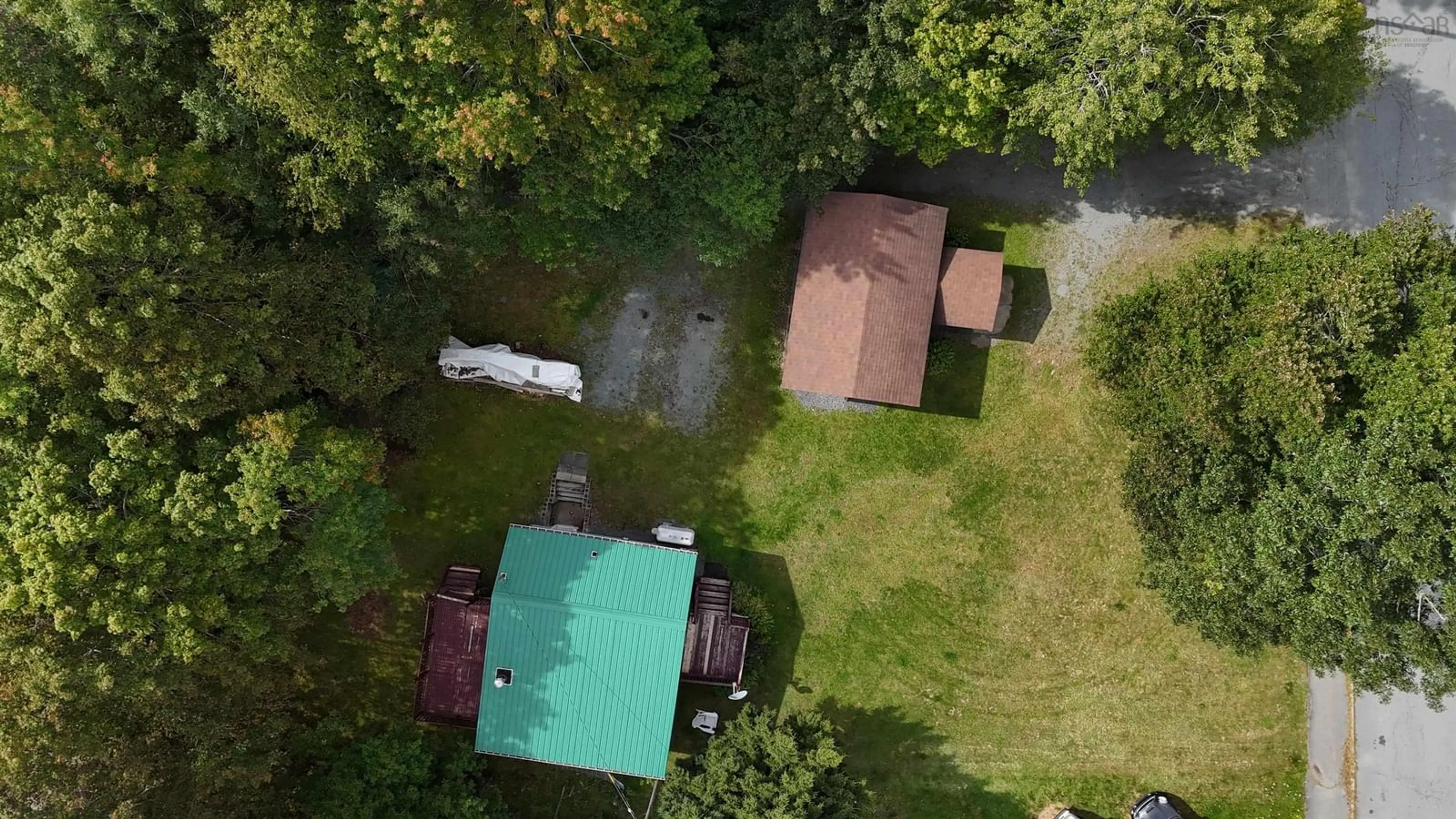 A pic from outside/outdoor area/front of a property/back of a property/a pic from drone, unknown for 115 Starr St, Bridgewater Nova Scotia B4V 2P8
