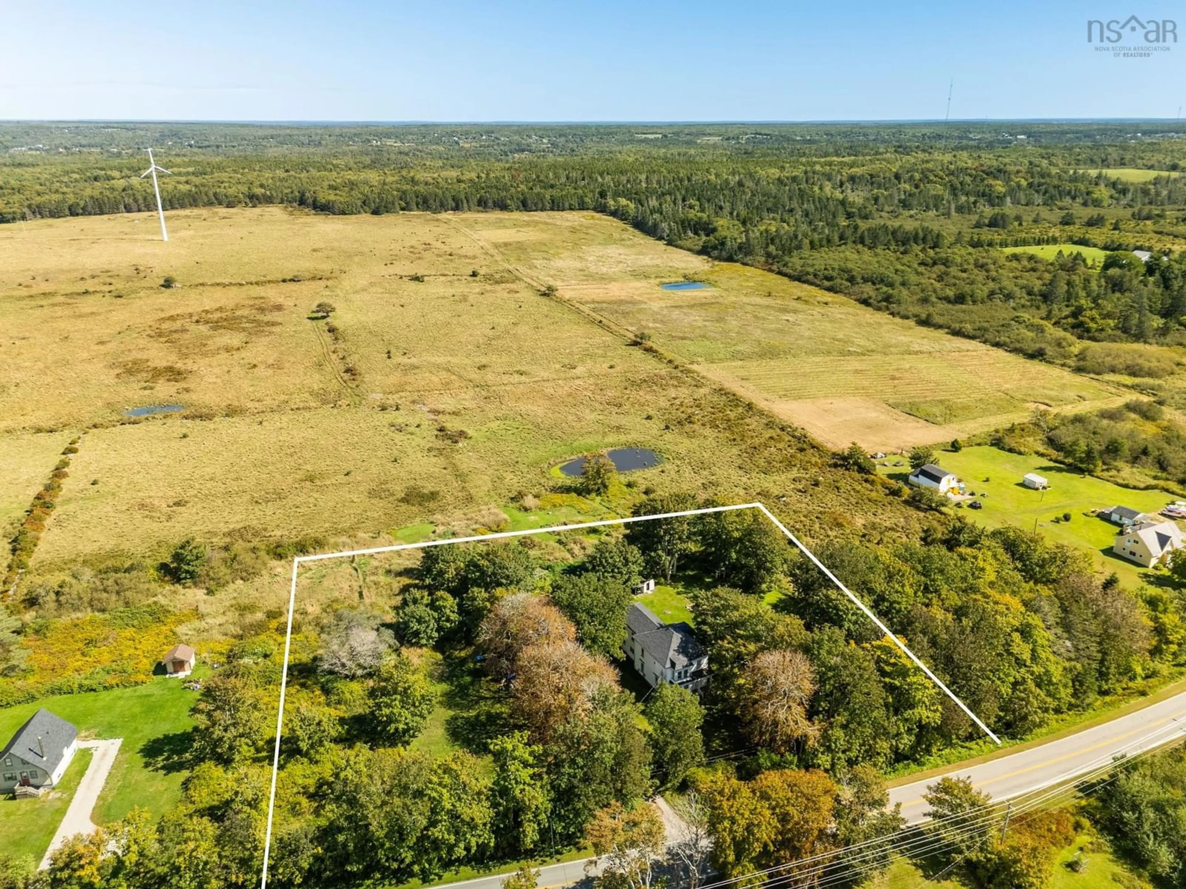 A pic from outside/outdoor area/front of a property/back of a property/a pic from drone, forest/trees view for 1786 Highway 1, Wellington Nova Scotia B5A 5A6