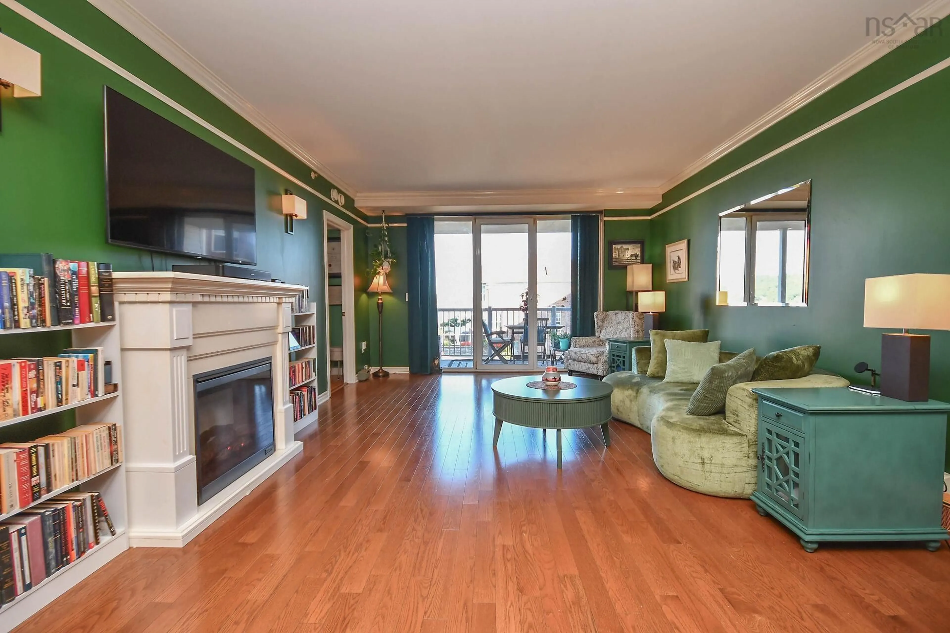 Living room with furniture, wood/laminate floor for 50 Waterfront Dr #202, Bedford Nova Scotia B4A 4H3